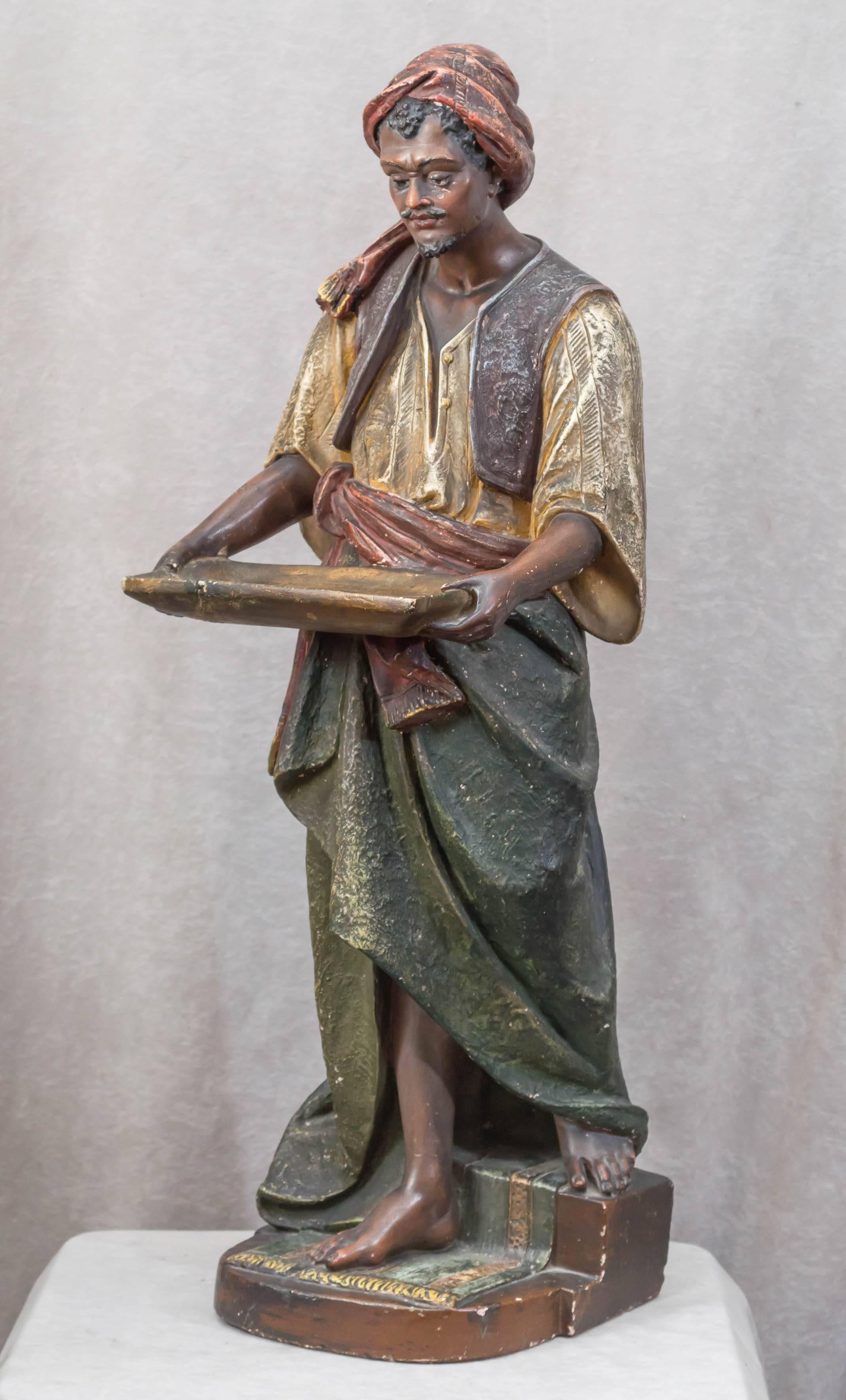 Moorish Large Plaster Sculpture of an Arab Merchant Holding a Tray