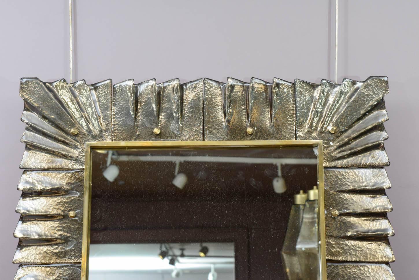 Decorative pair of Murano glass framed mirrors, with brass cabochons.