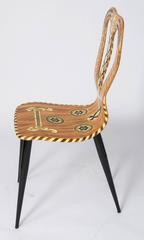 Atelier Fornasetti lacquered chair "Musicale", Italy 1989