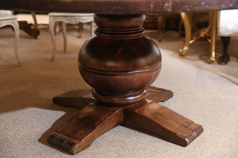 Large Round Dining Table with Distressed Finish in Dark Pine at 1stDibs