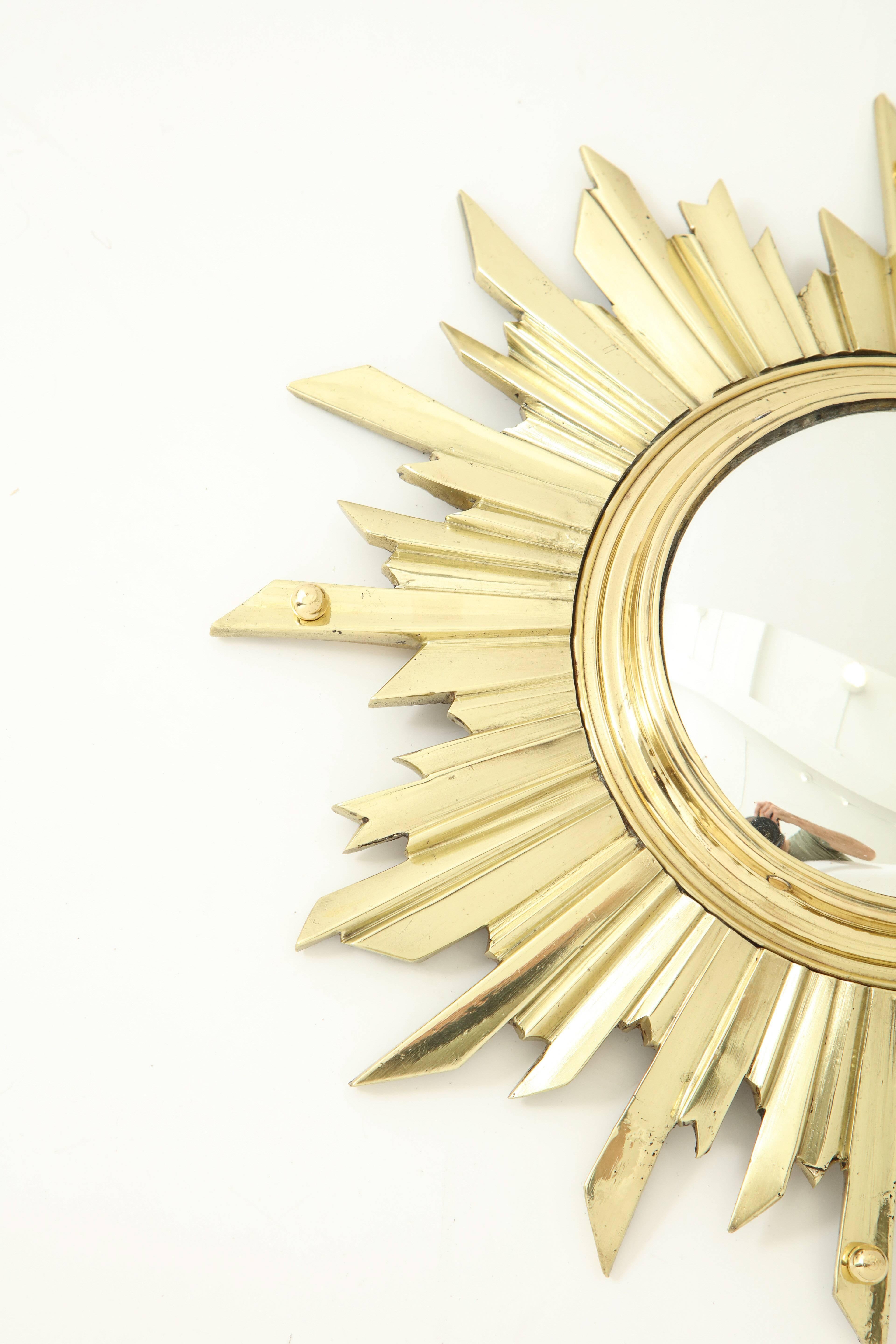 Unknown Unusual Bronze Sunburst Mirror For Sale