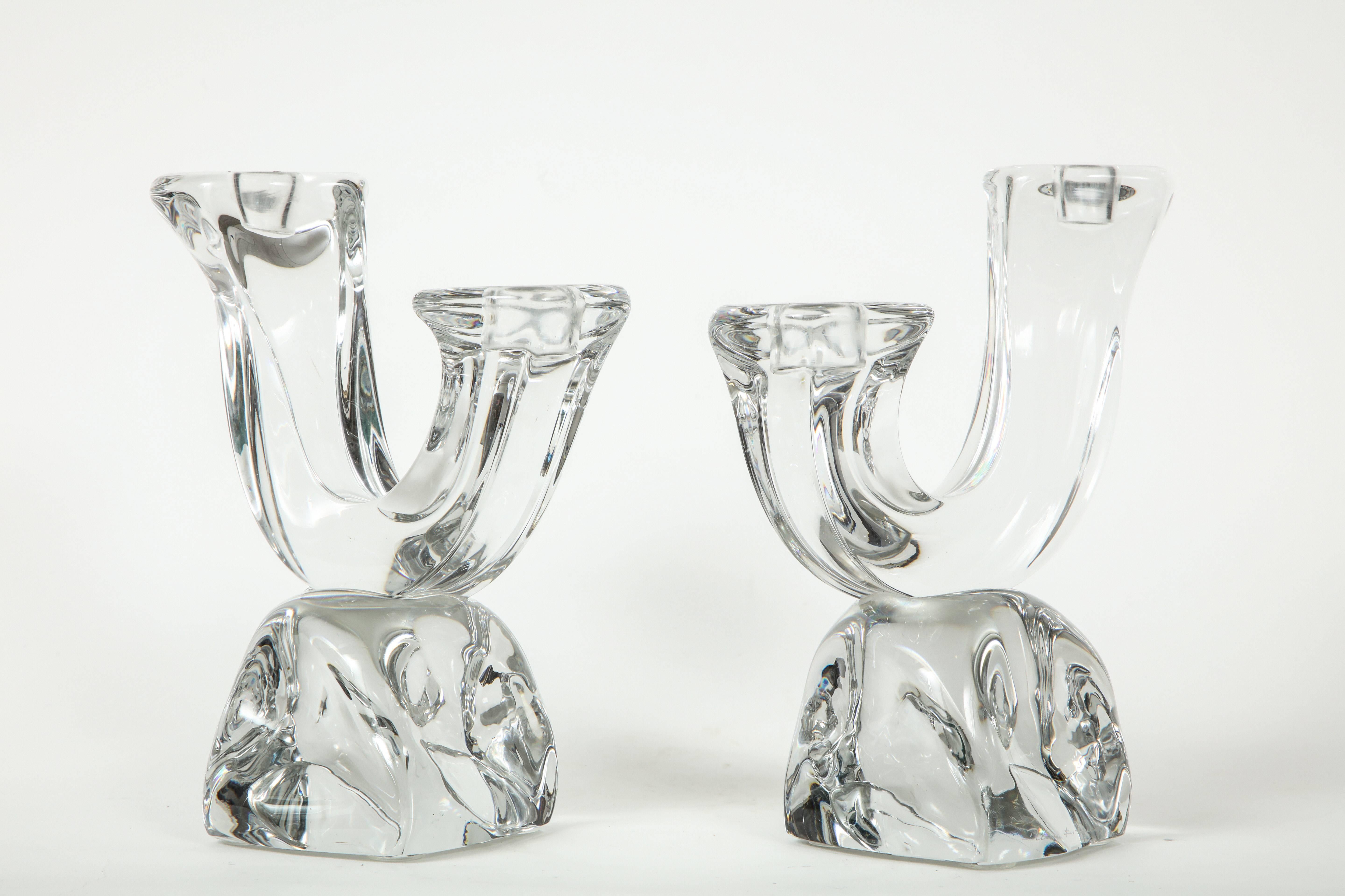 Rare pair of 1950s original chunky Daum candlesticks, a true icon of the time period. Heavy and quite impressive crystal to the eye. Signed Daum, Nancy. 