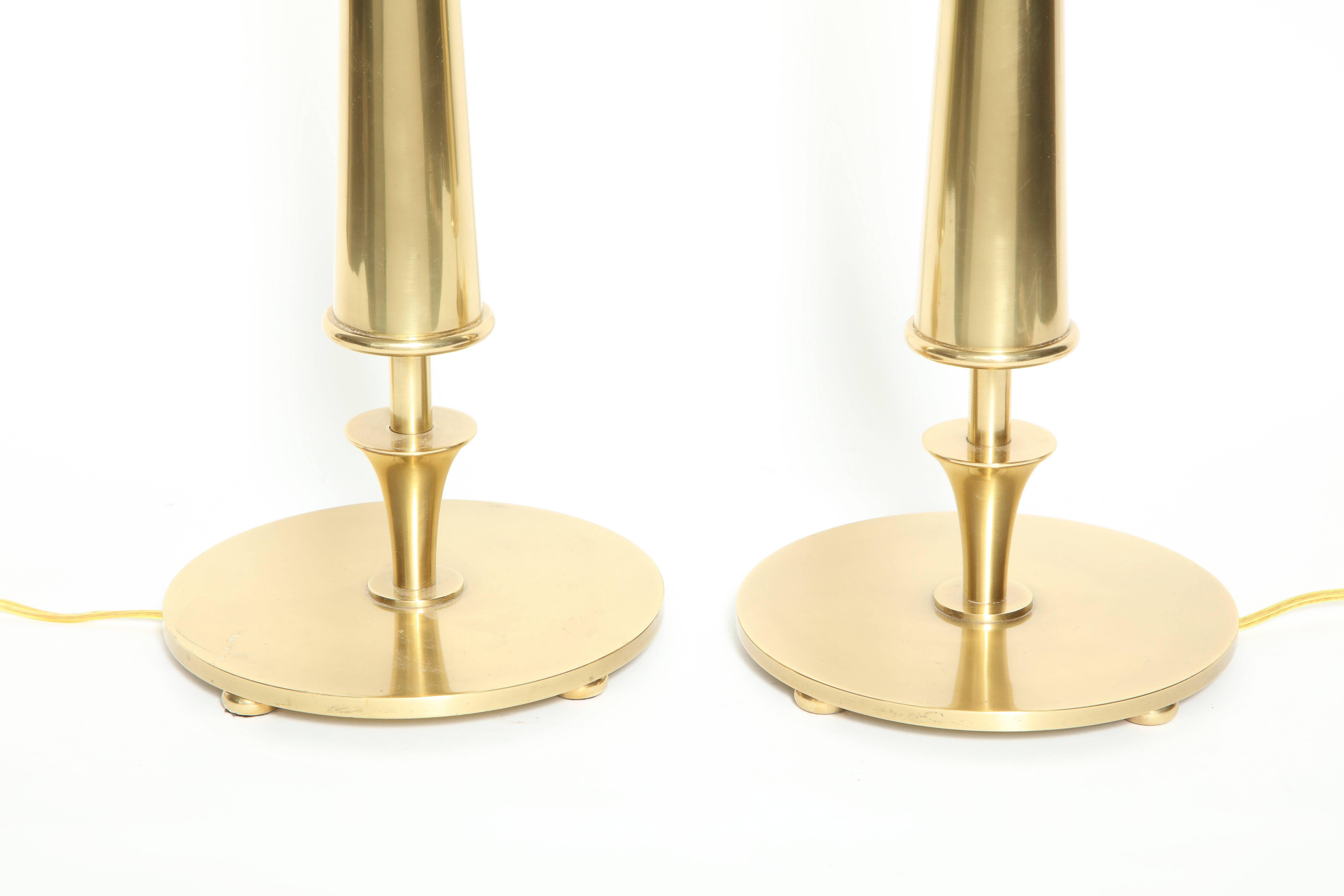 Modernist lamps with round bases and conical stems. Rewired.