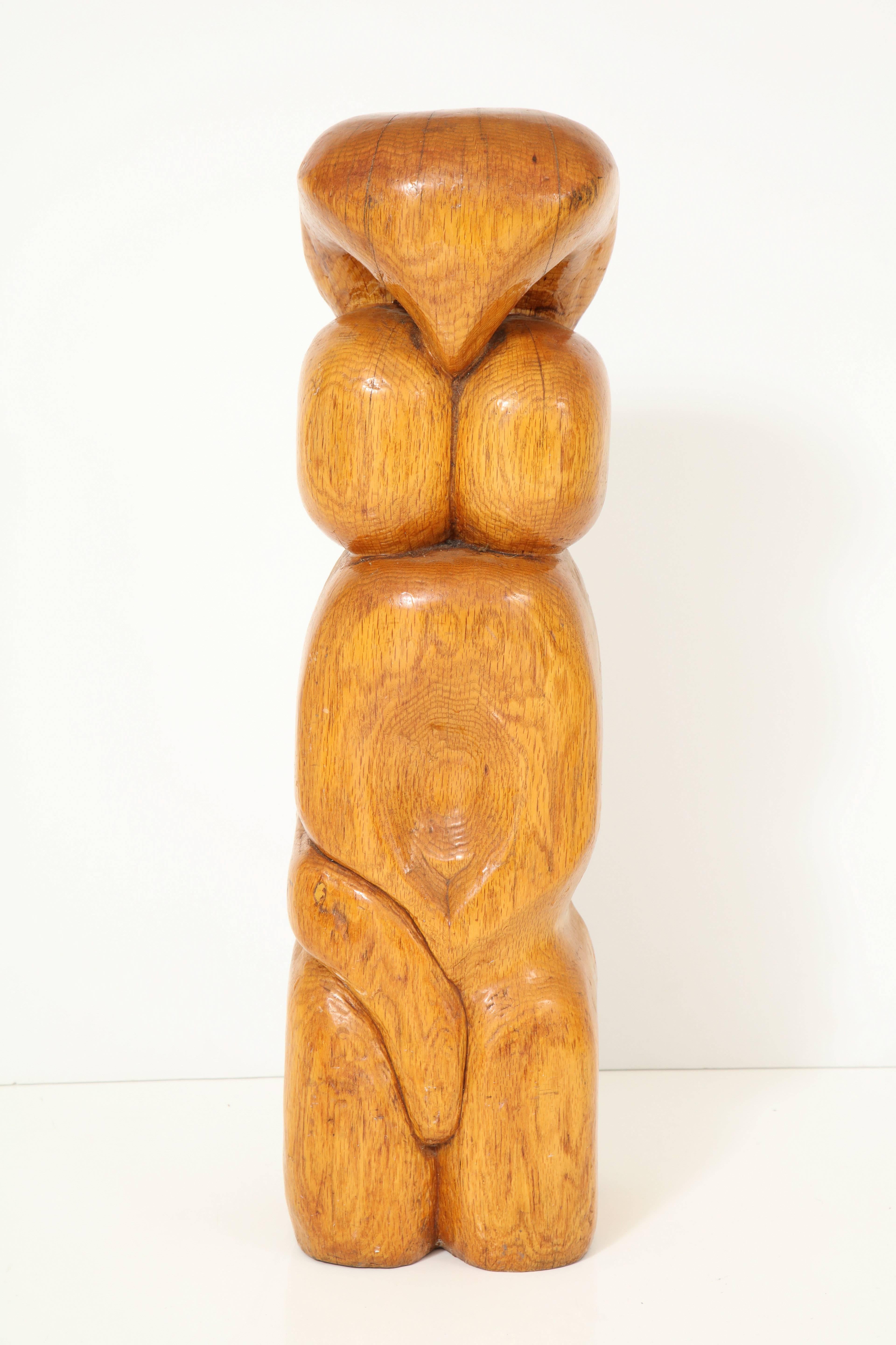Midcentury wood carving, seems to represent a female figure. Oregon pine.