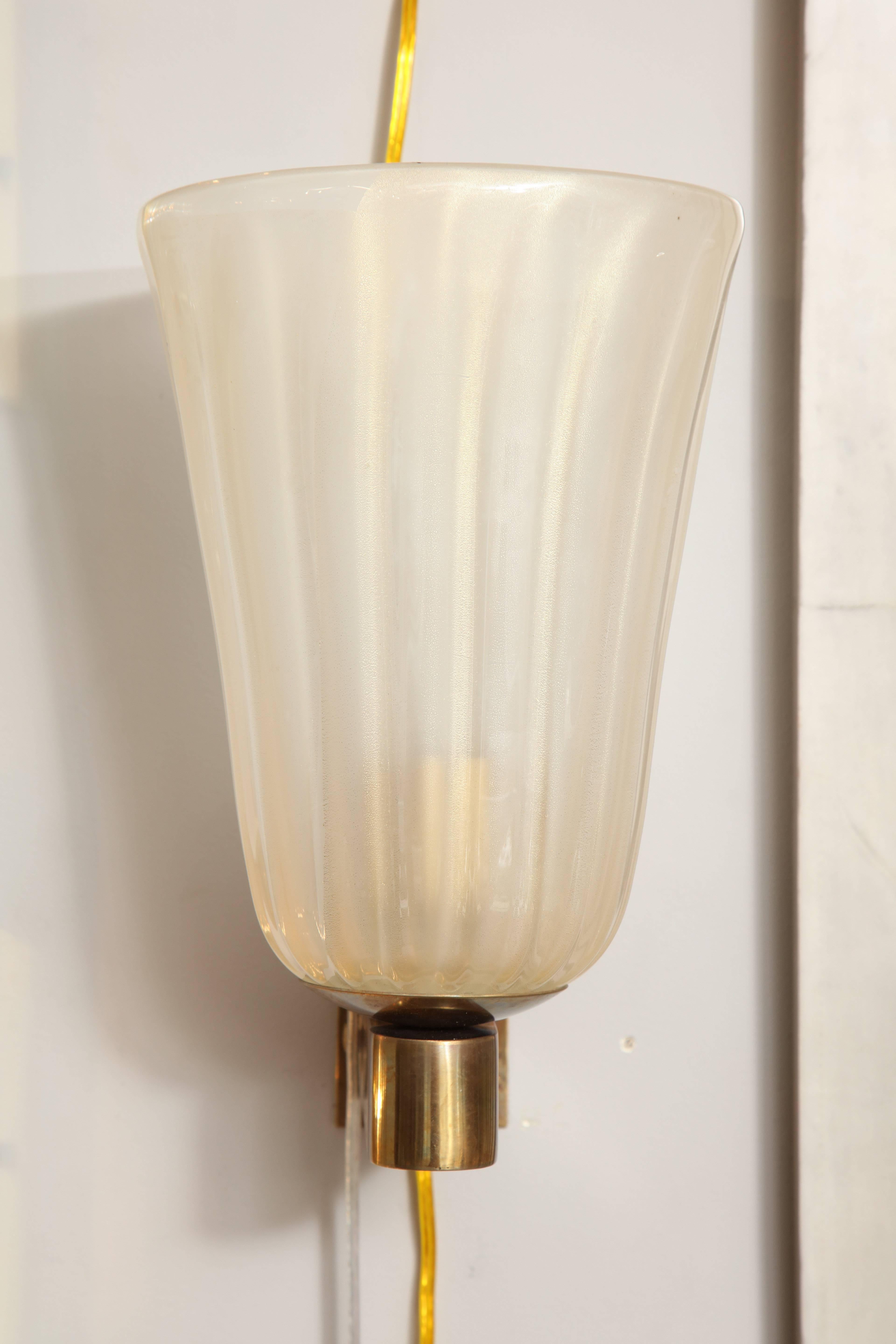 Pair of Murano glass and brass wall sconces.