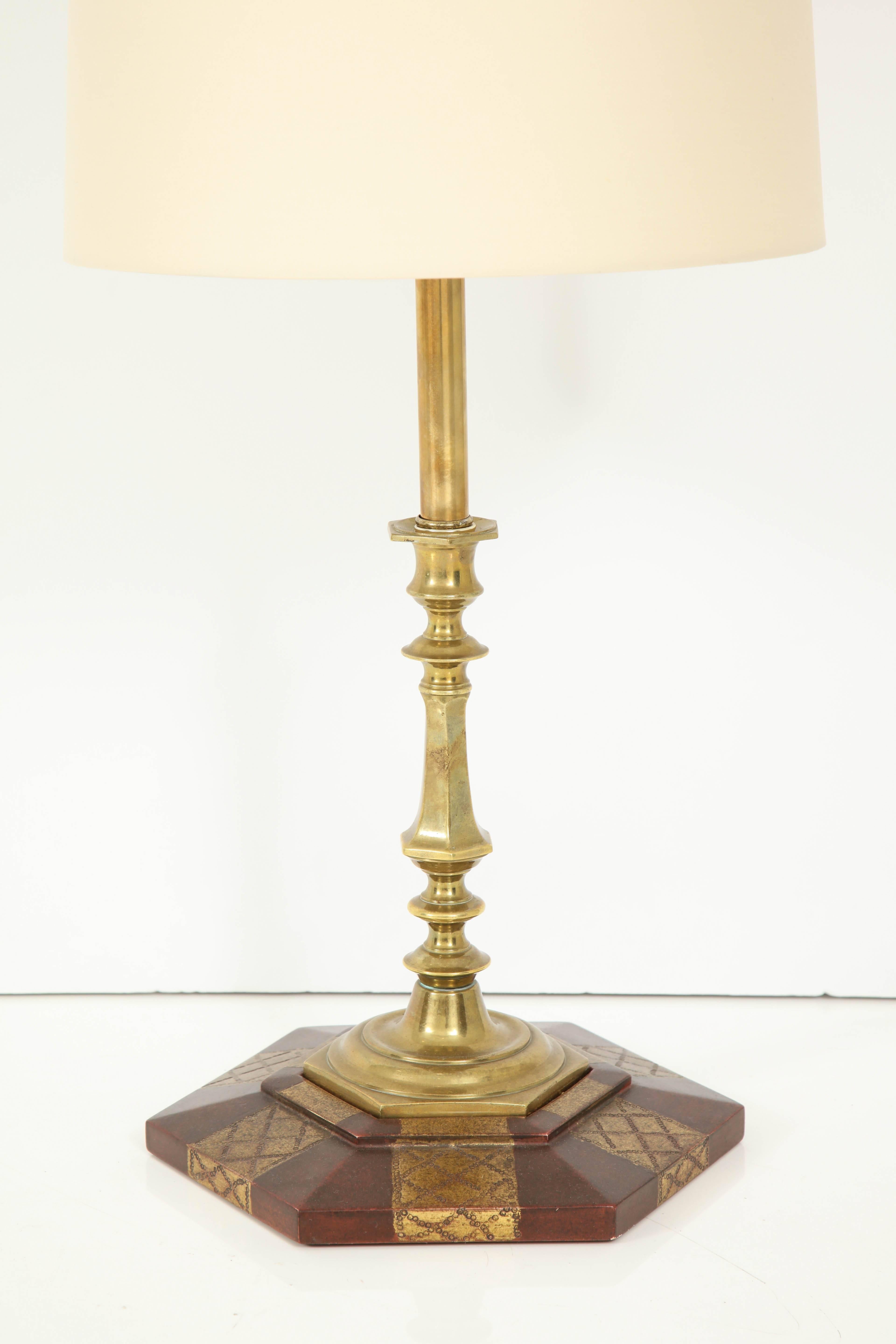 Pair of early American brass candlesticks converted to lamps with custom gilded bases, silk drum shades.
    