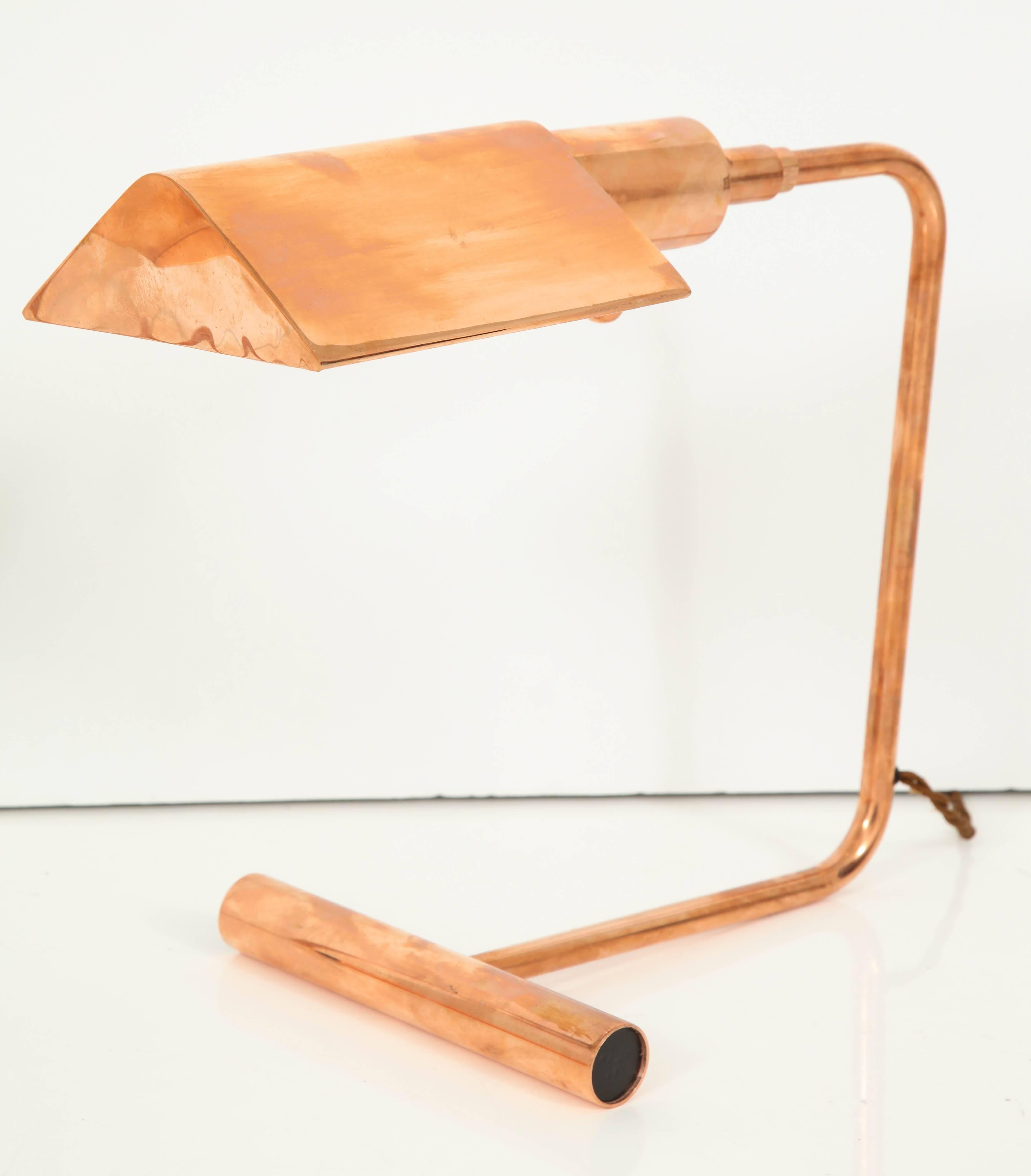 Pair of Koch and Lowy pivoting desk lamp, circa 1970. Plated in natural copper finish.