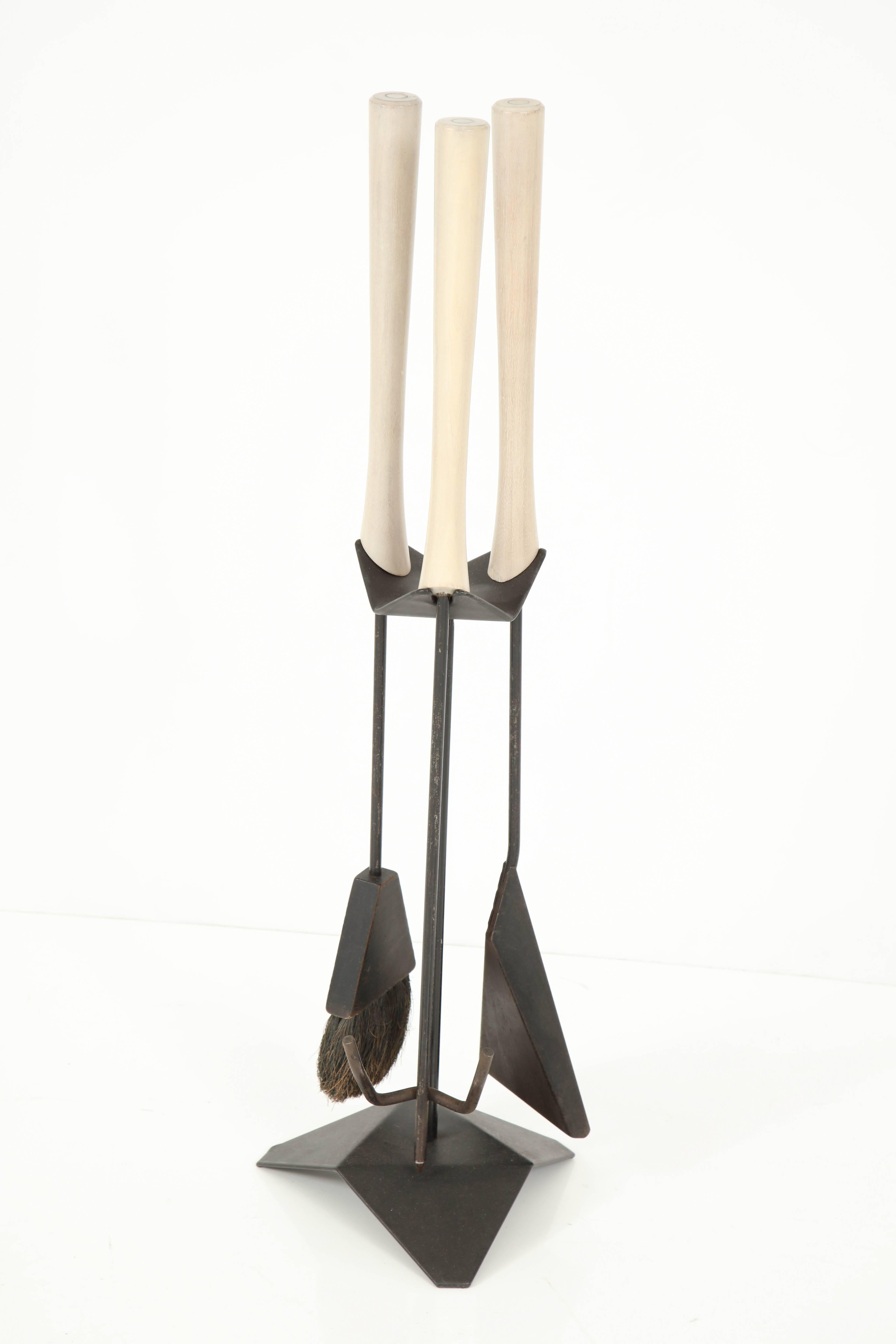 Set of Modernist fireplace tools in iron with whitewashed maple handles, circa 1960.