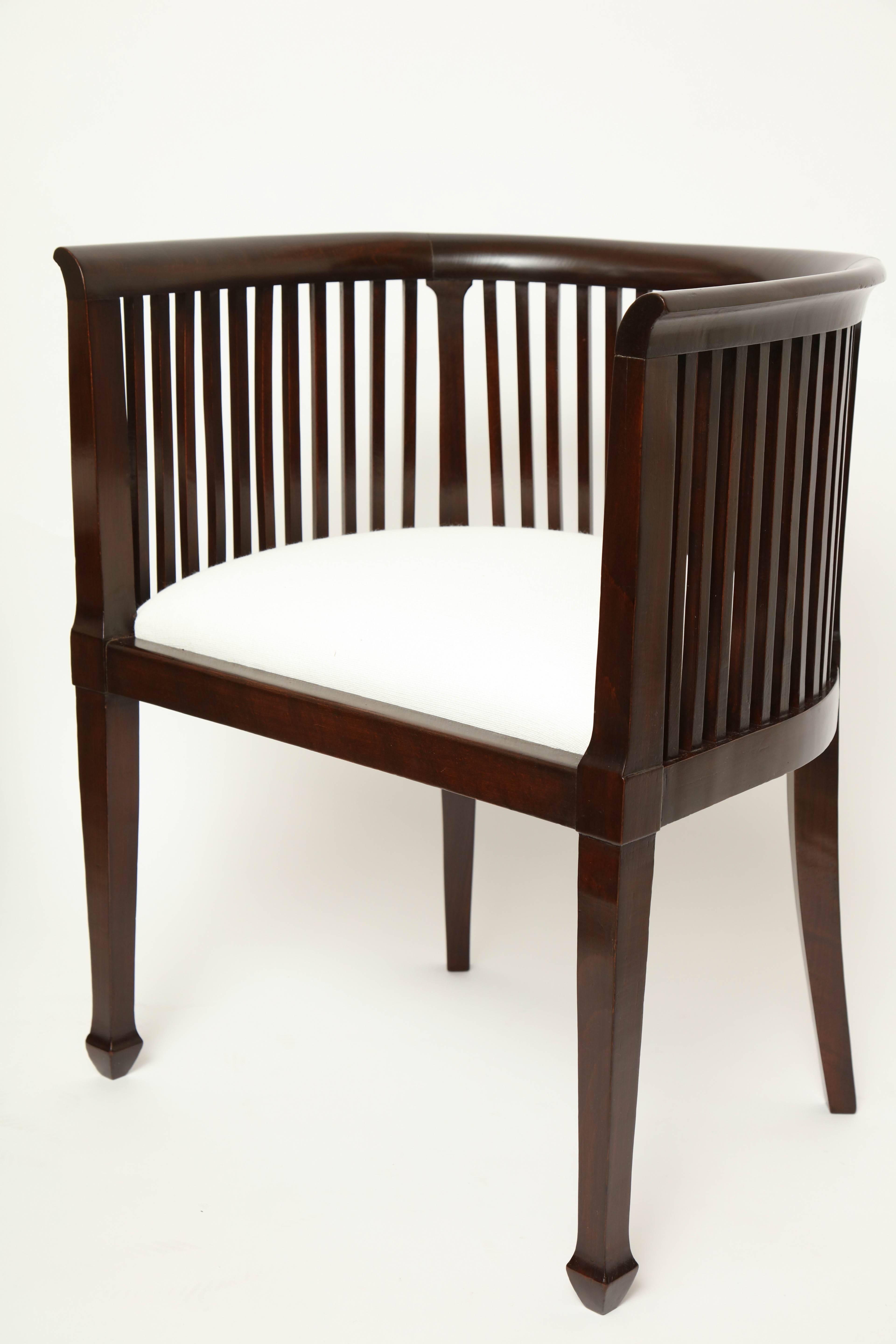 Pair of curved back and slatted mahogany chairs. Newly upholstered in Belgian linen.