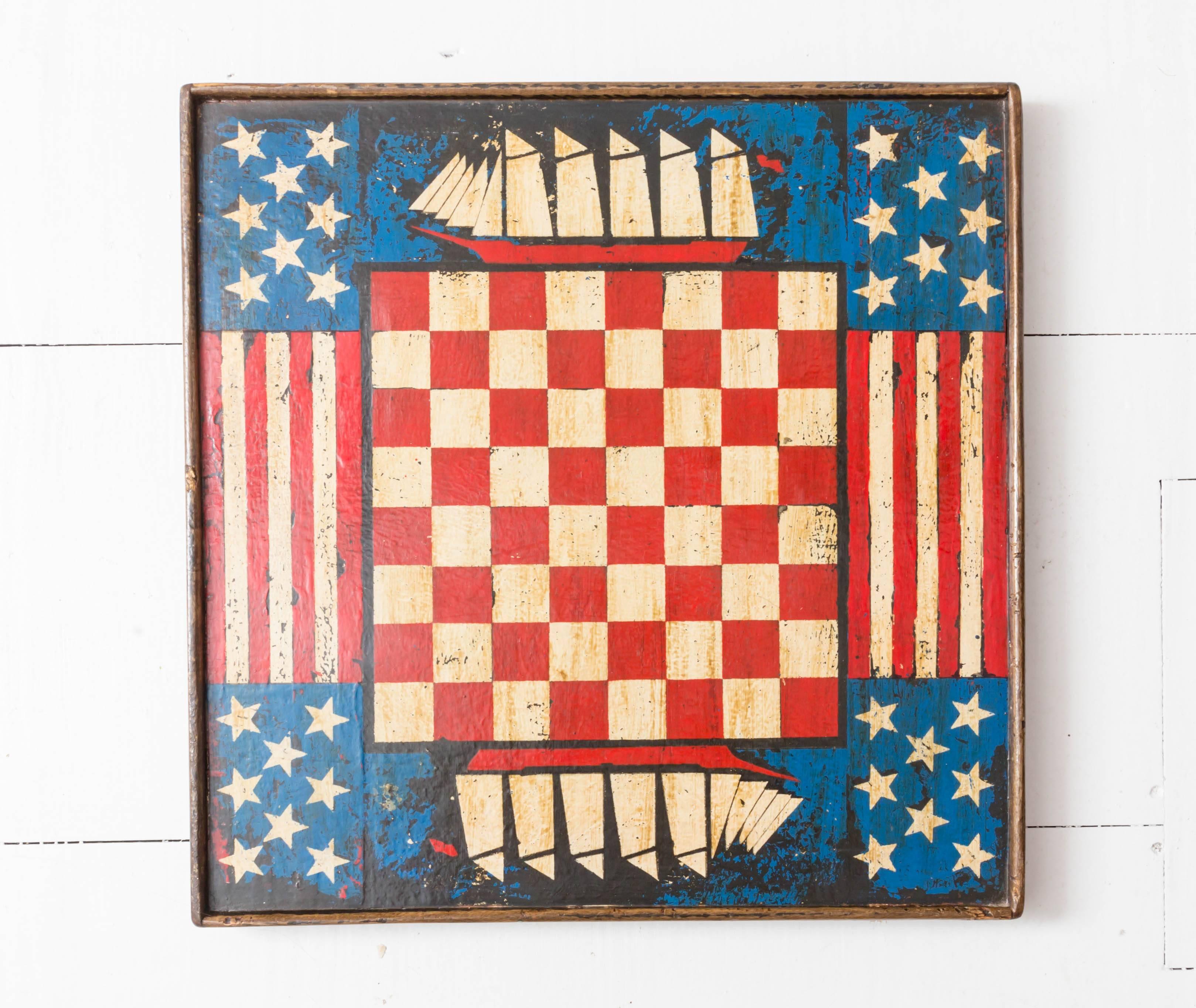 Vintage paint decorated Americana game board. Schooners, stars and stripes.