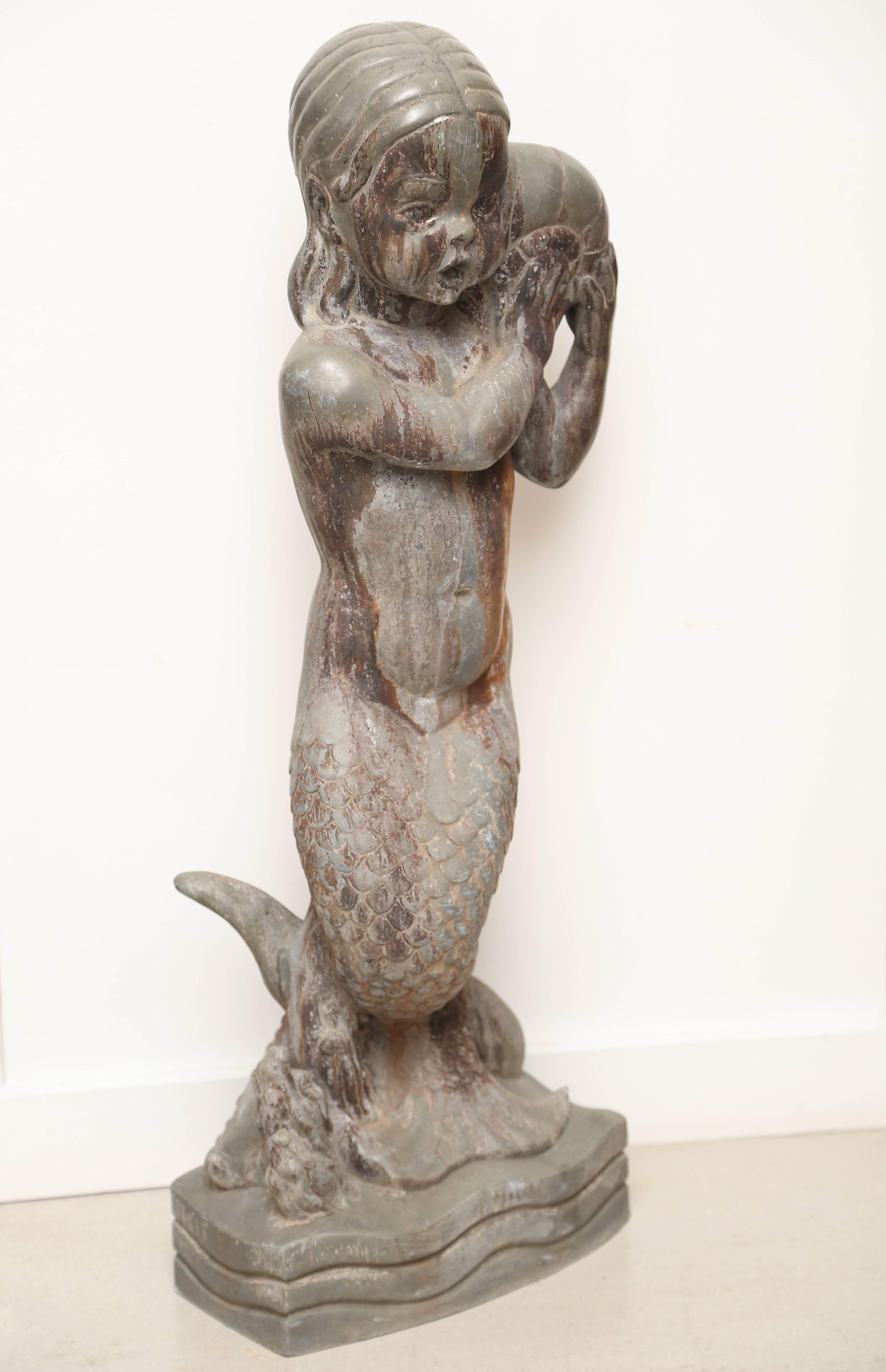 Mermaid sculpture by listed artist Wheeler Williams. The sculpture is signed, dated, and titled: Amphitrite 1939.

Wheeler was an award winning sculptor best known for his allegorical, narrative work.
American (1897-1972).

 