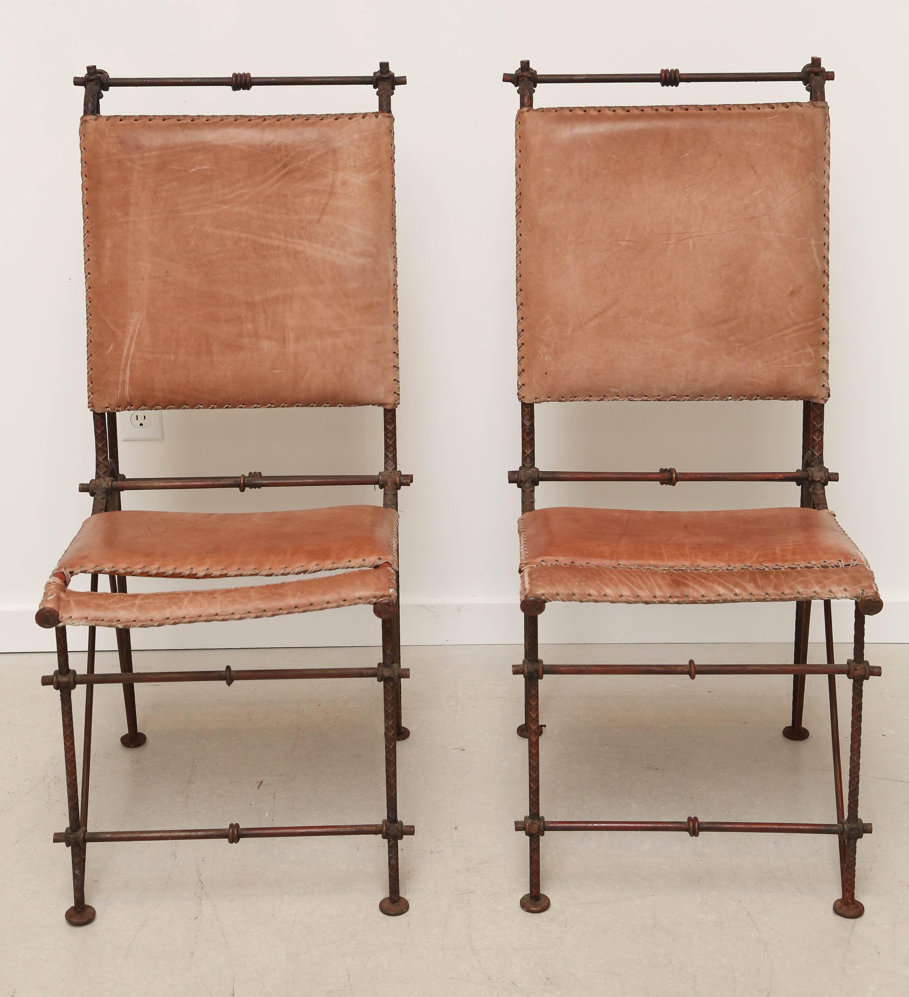 Set of dining chairs made of rebar and leather.
Goor is considered to be an international multidisciplinary artist. Her works encompass sculptures, furniture, Judaica, lighting fixtures, jewelry and fashion items which are displayed in well-known