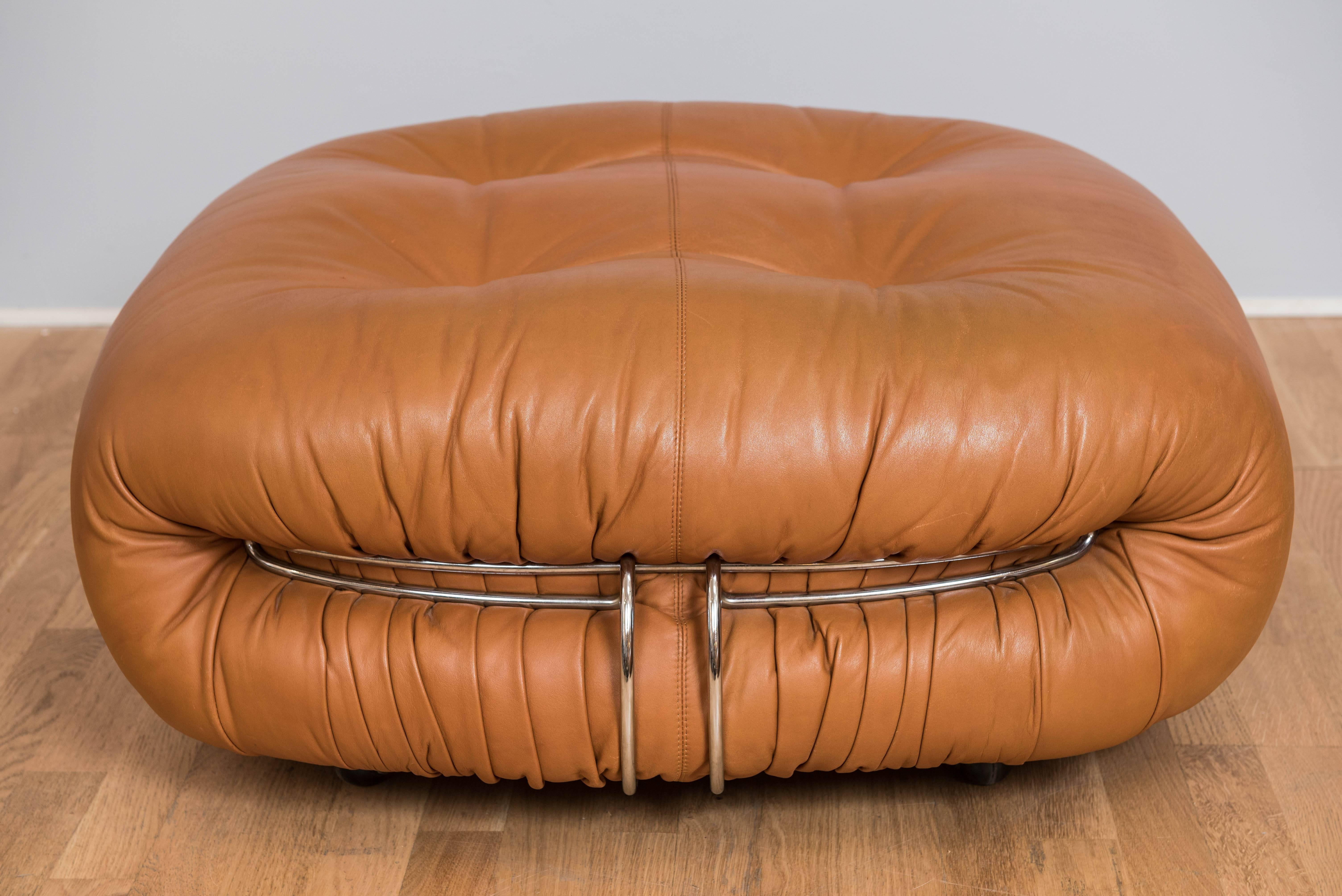 This multi-functional ottoman in a rich caramel colored leather is designed by Afra and Tobia Scarpa for luxury furniture and design manufacturer Cassina of Italy in the 1970s. It compliments many design forward rooms and matches the
Soriana sofa