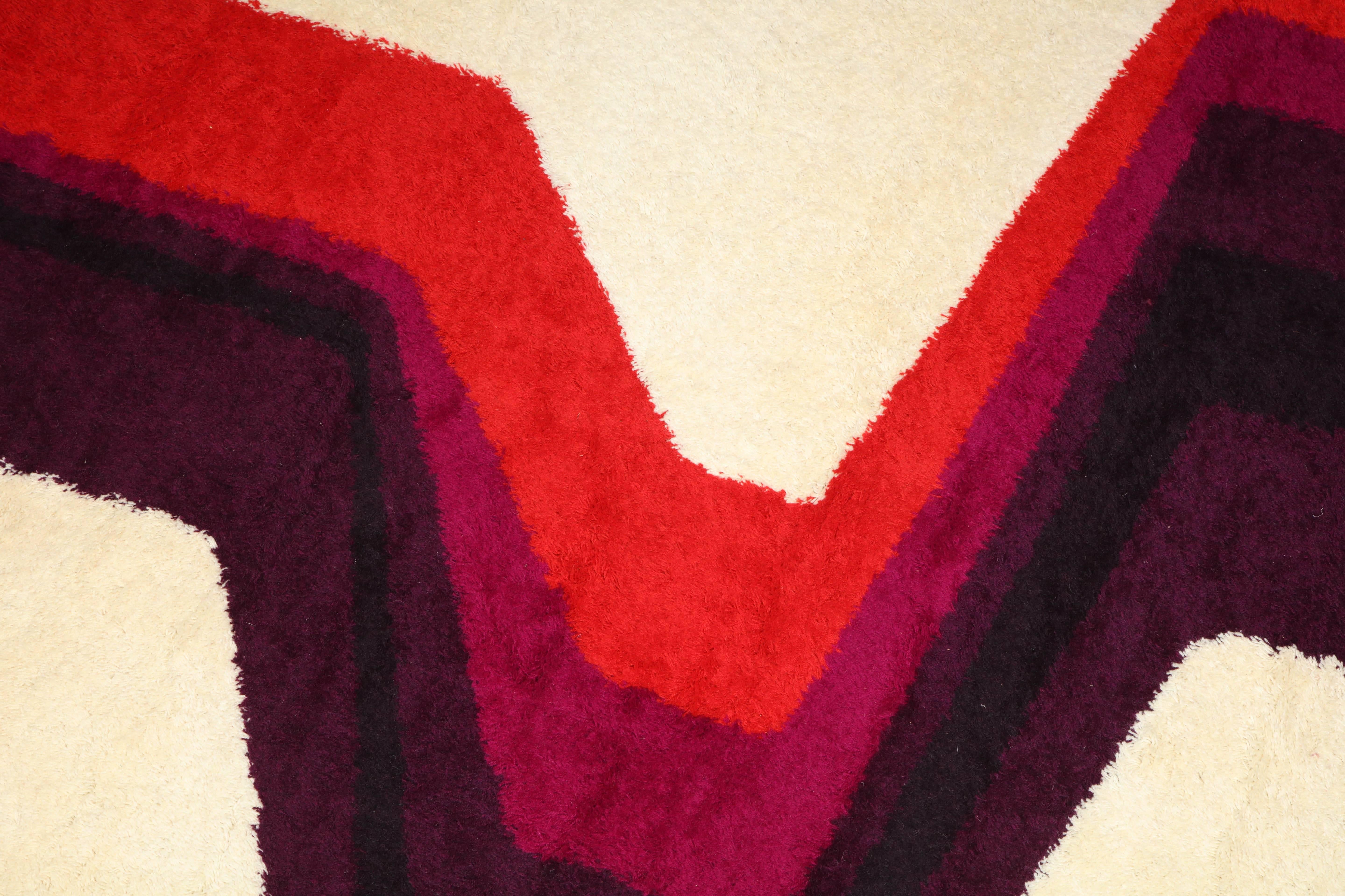 Hojer Eksport Wilton carpet made in Denmark, 1960, Technique created by Marguerite Rye called the Rye technique. Great graphic design in wool with bold colors of ivory ground with burgundy, plum, orange and black, signed on reverse side with