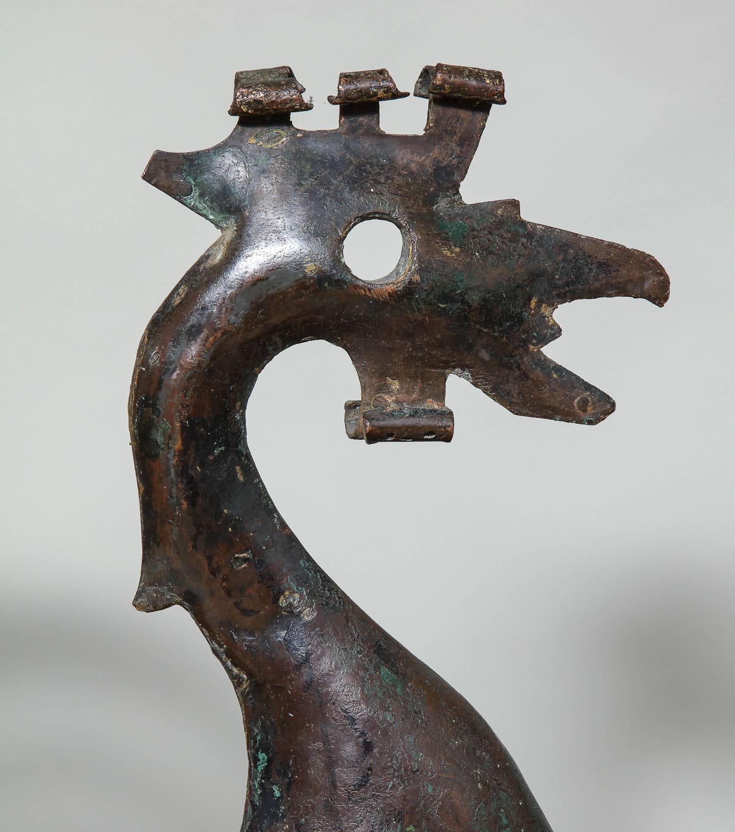 Very fine 18th century English hand-hammered copper full bodied rooster weathervane, the comb and waddle formed by curled copper, the eye and tail with pierced decoration, the whole with good bronze like surface.

Sizes include the wood stand.
 