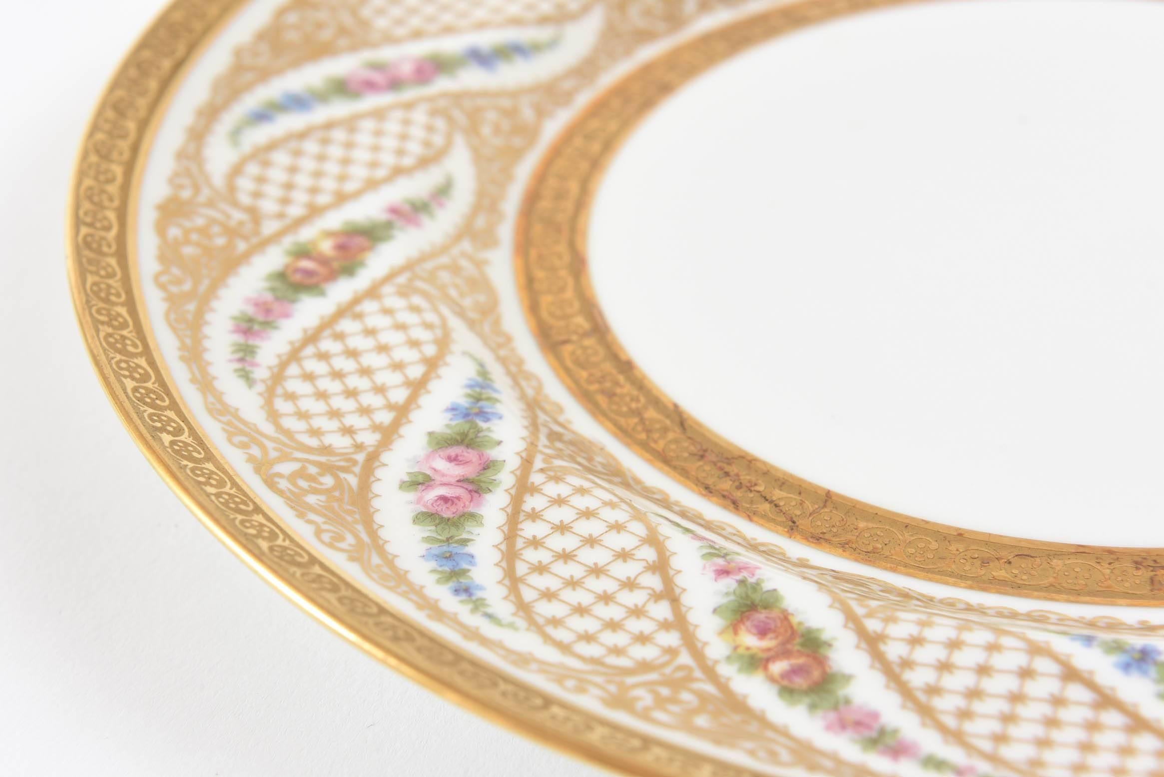 Antique Limoges Dinner Plates, Set of 11 with Interesting Swirl Flower Design In Good Condition In West Palm Beach, FL