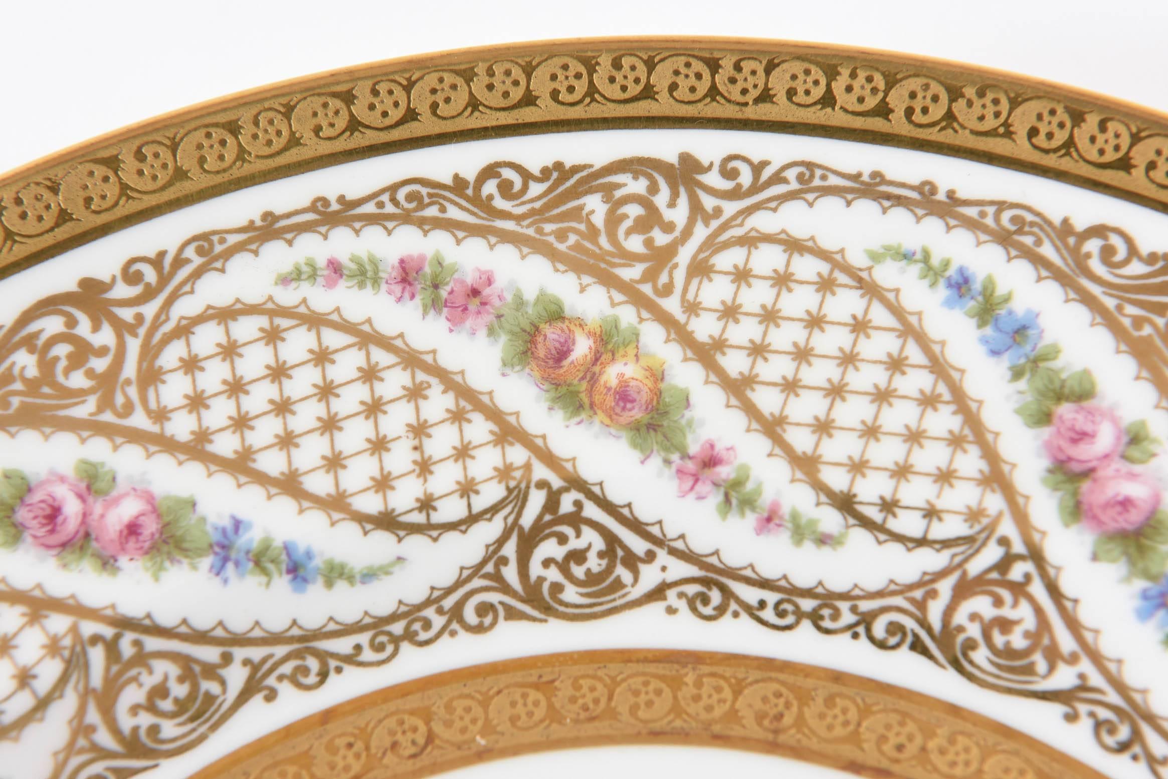 Early 20th Century Antique Limoges Dinner Plates, Set of 11 with Interesting Swirl Flower Design