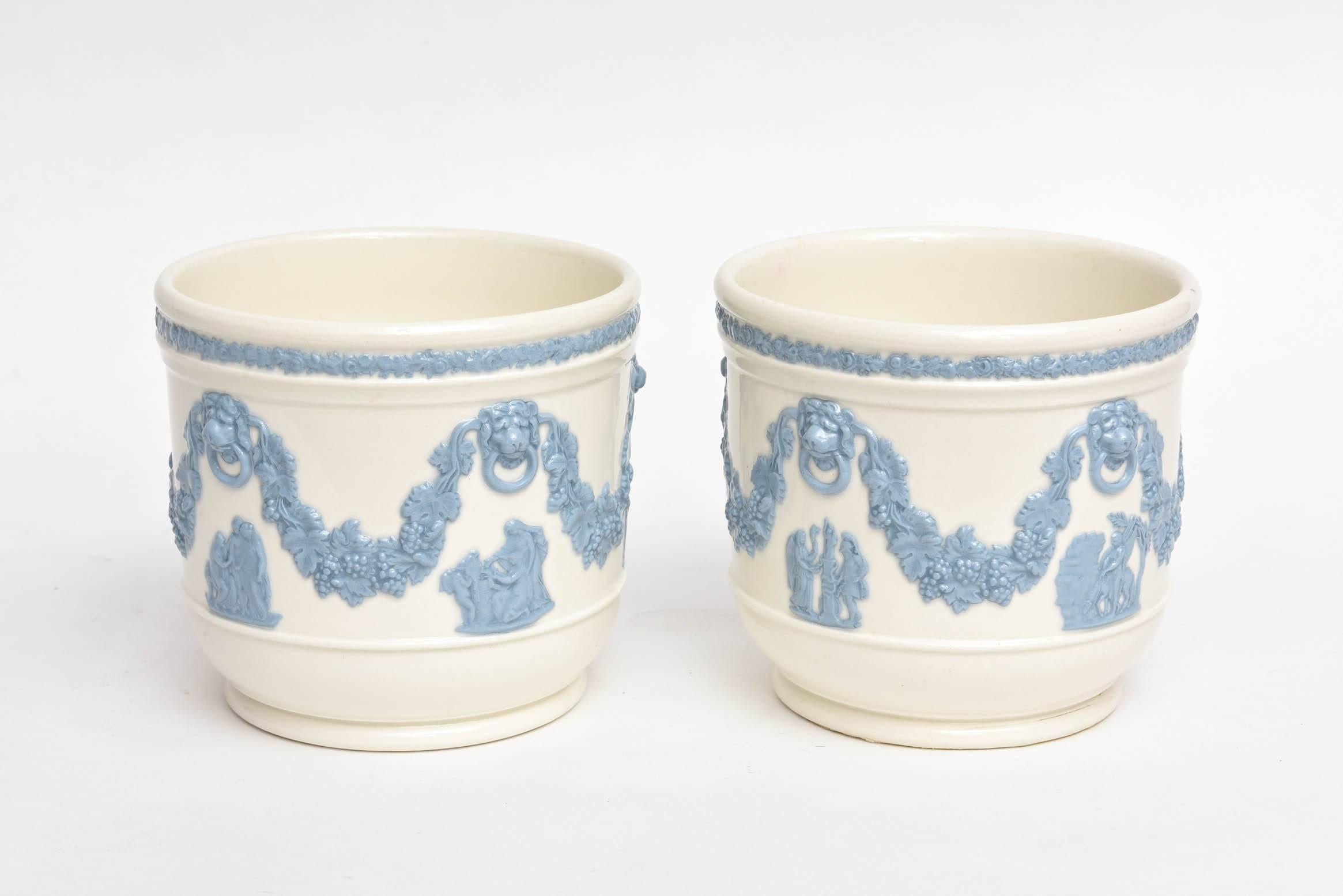 A darling pair of turquoise on a creamy white color porcelain 