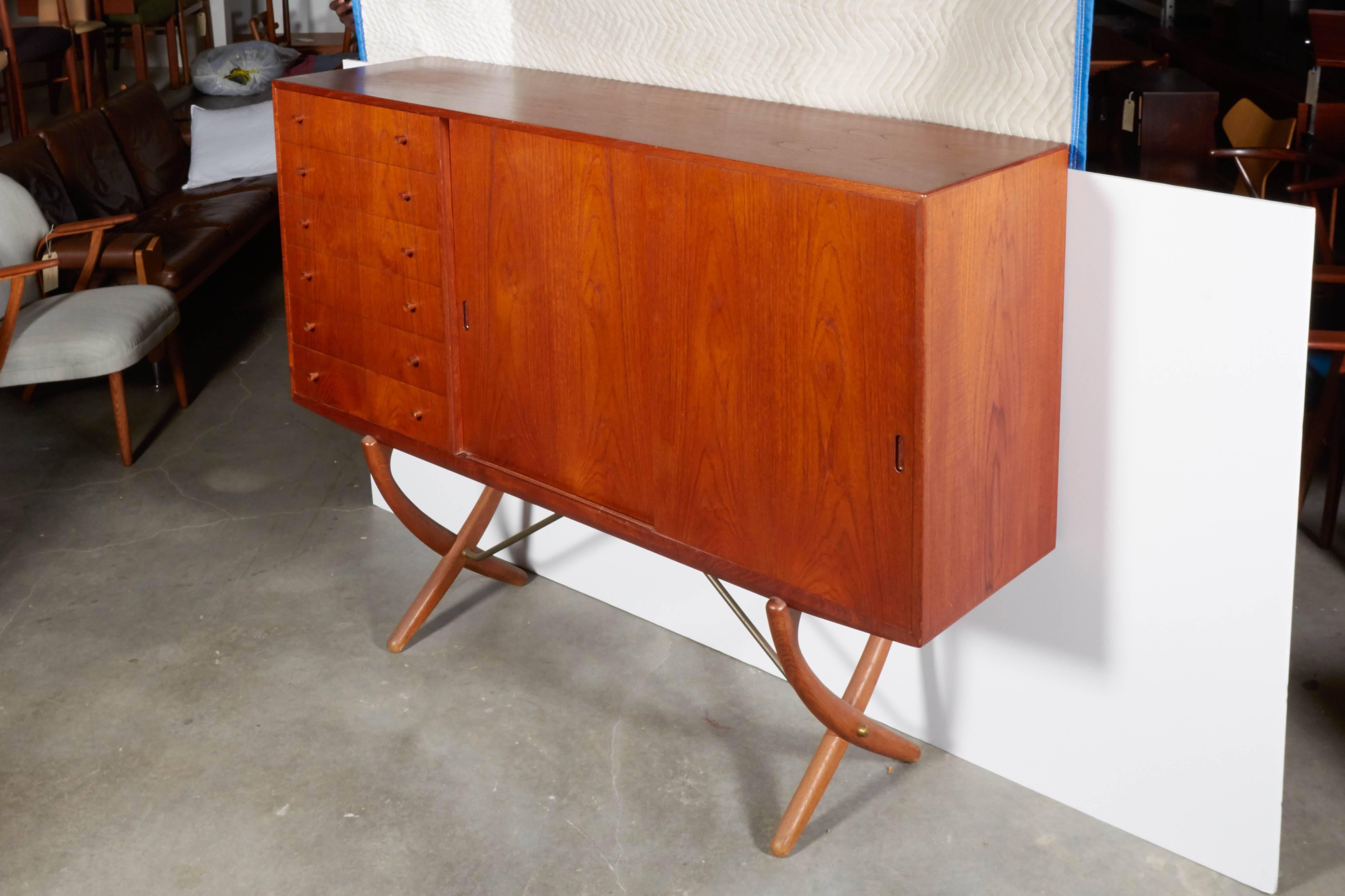 Scandinavian Modern Danish Teak Cupboard by Hans Wegner Aka Saber Leg