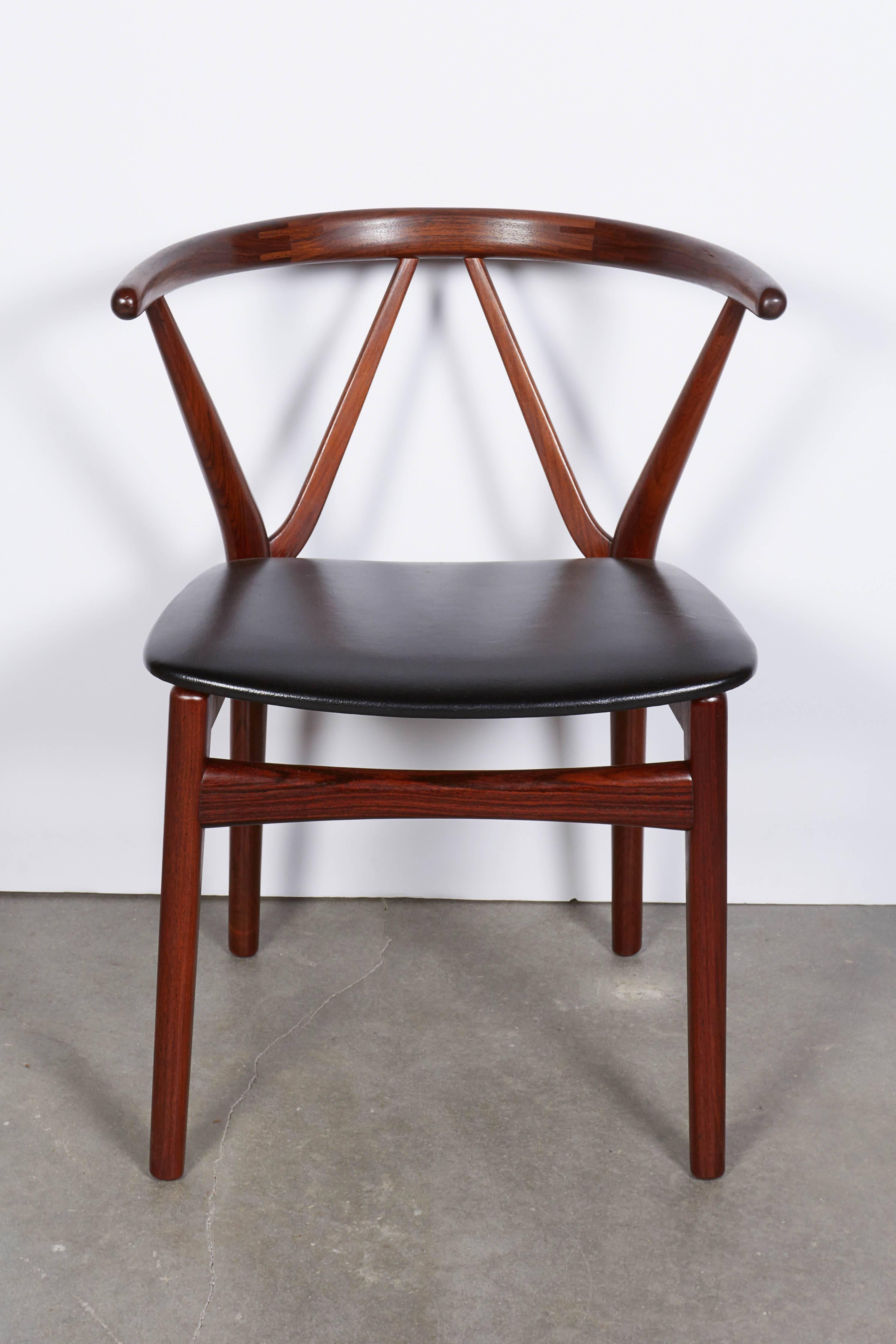 Scandinavian Modern Rosewood Dining Chairs by Henning Kjaernulf, Set of Four For Sale