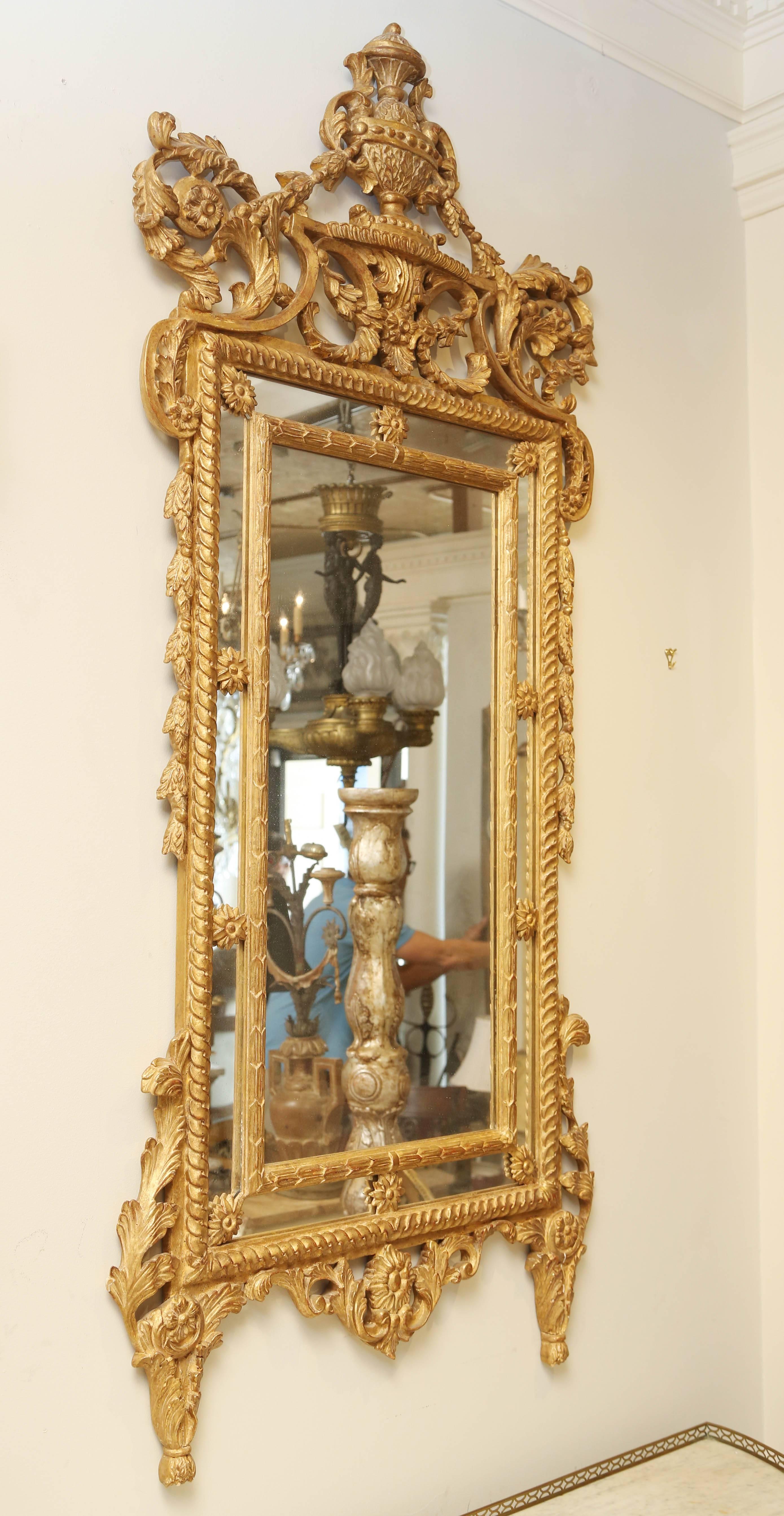 20th Century Pair of Carved Giltwood Louis XVI Mirrors