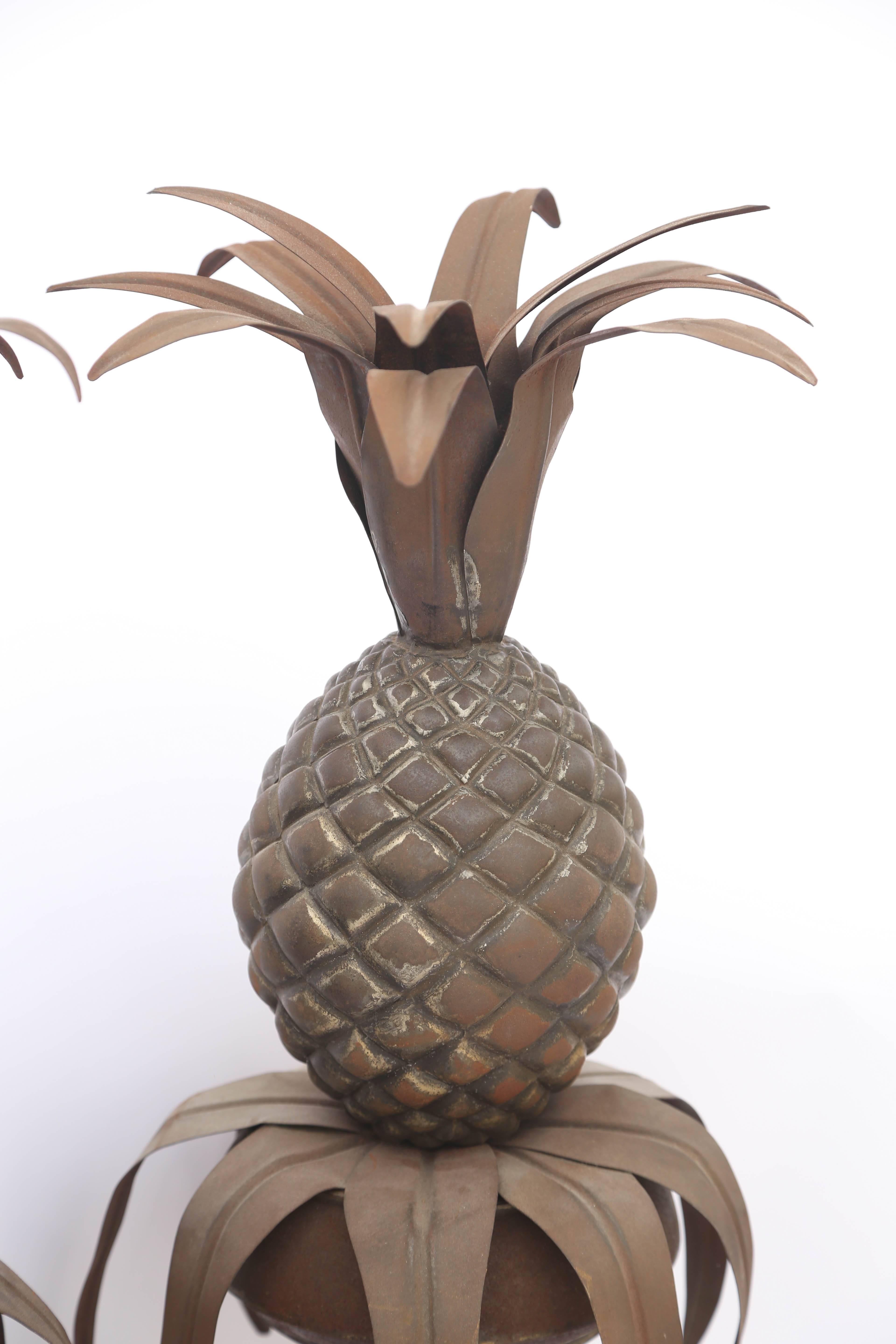 Pair of Tole Pineapples in Urns In Distressed Condition For Sale In West Palm Beach, FL