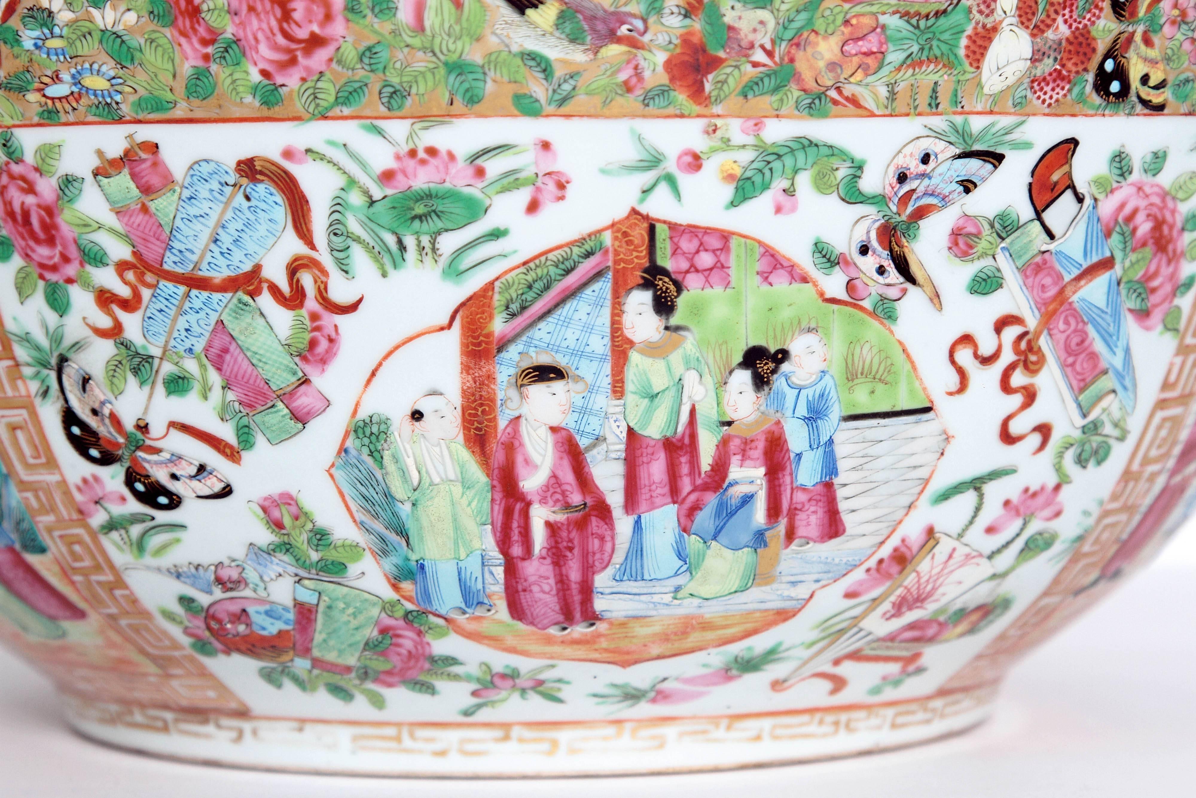 A large 'Canton Famille Rose' punch bowl in the 'Rose Medallion' pattern with panels of Chinese garden scenes and Chinese ladies within numerous borders, repeated inside
Measures: 16 in. diameter