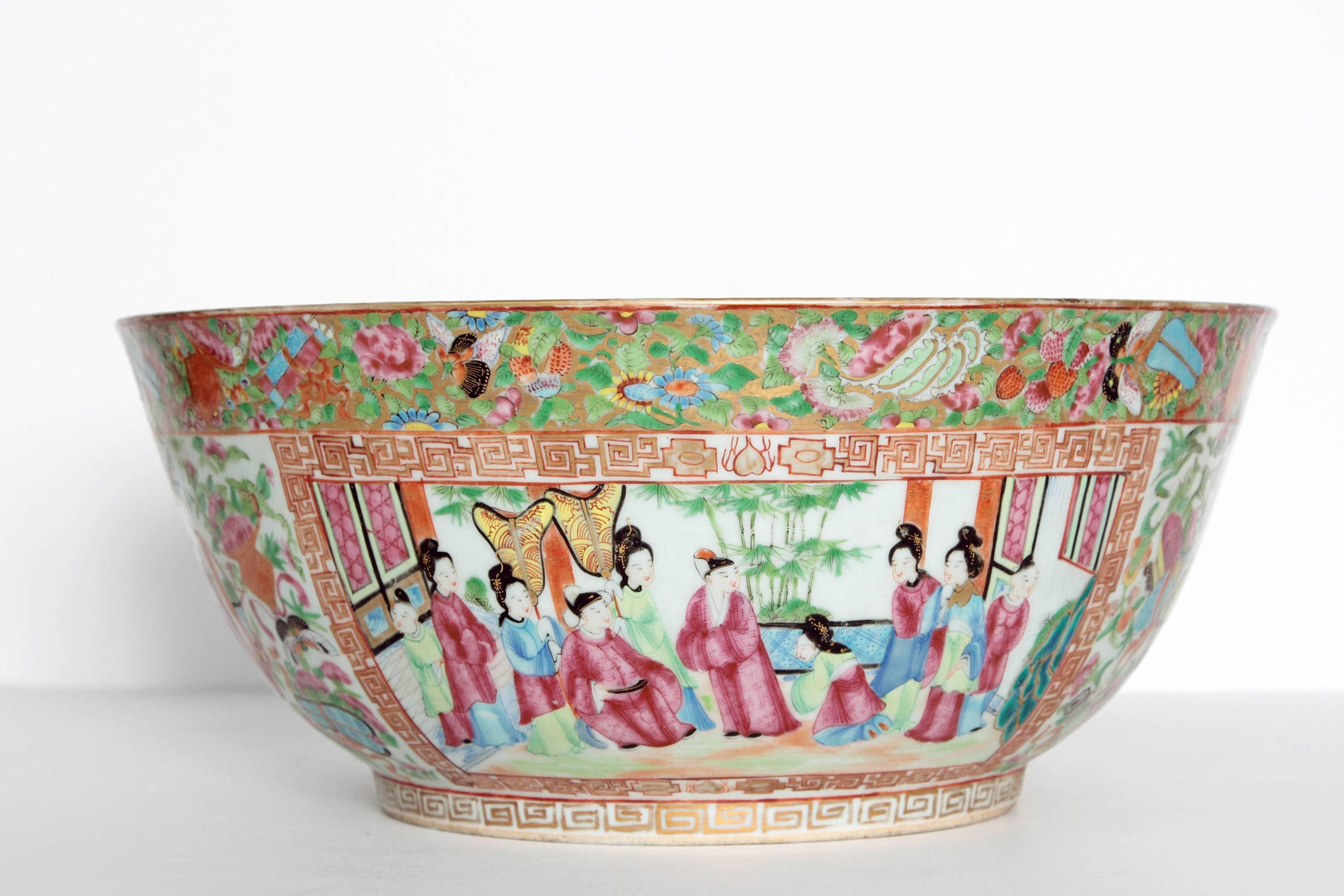 A 'Canton Famille Rose' punch bowl in the 'Rose Medallion' pattern with panels of Chinese garden scenes and Chinese ladies within numerous borders, repeated inside
13.5 in. diameter.