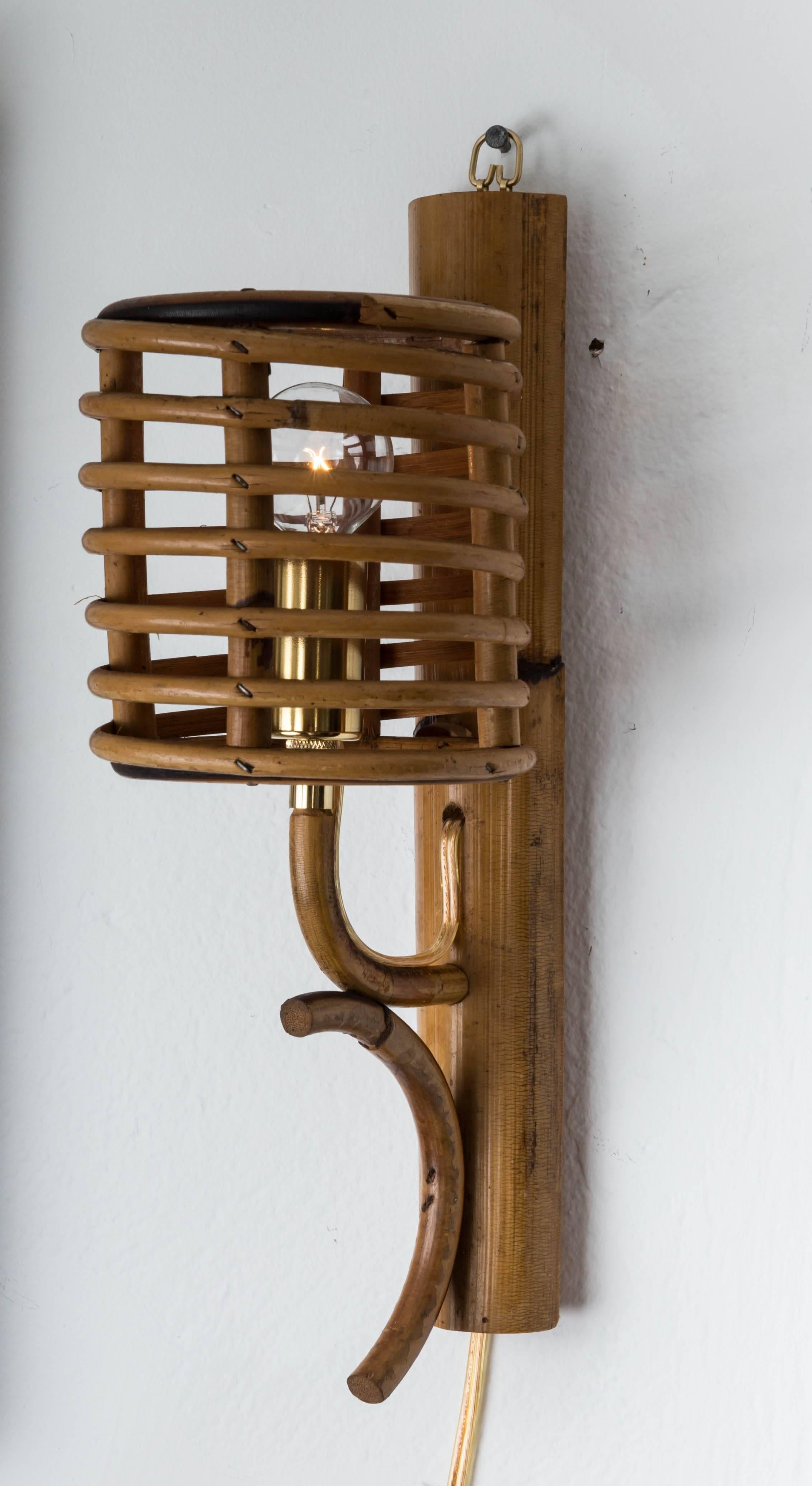 Petite bamboo sconce, one in stock.