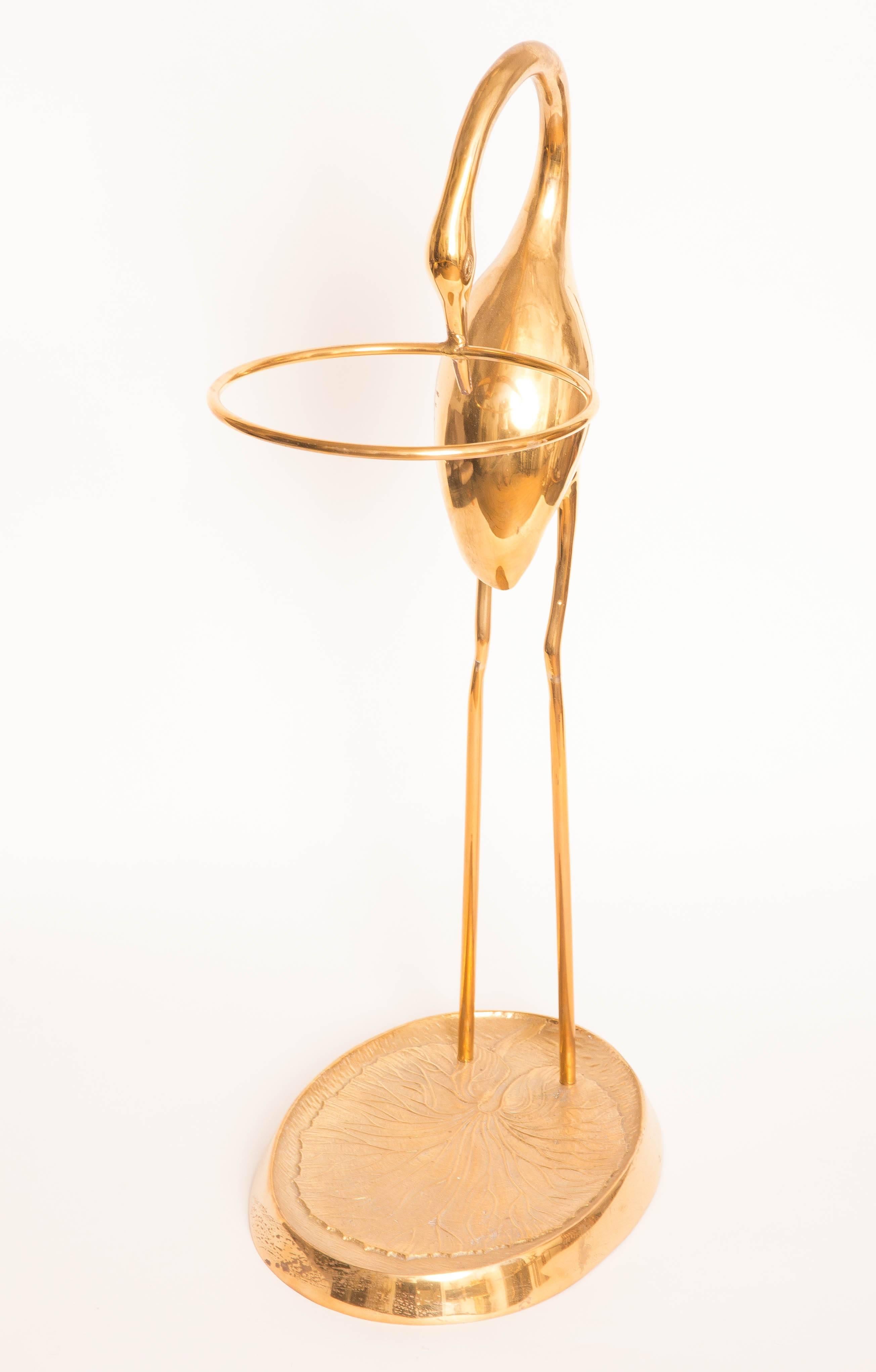 Brass sculptured heron form umbrella stand.