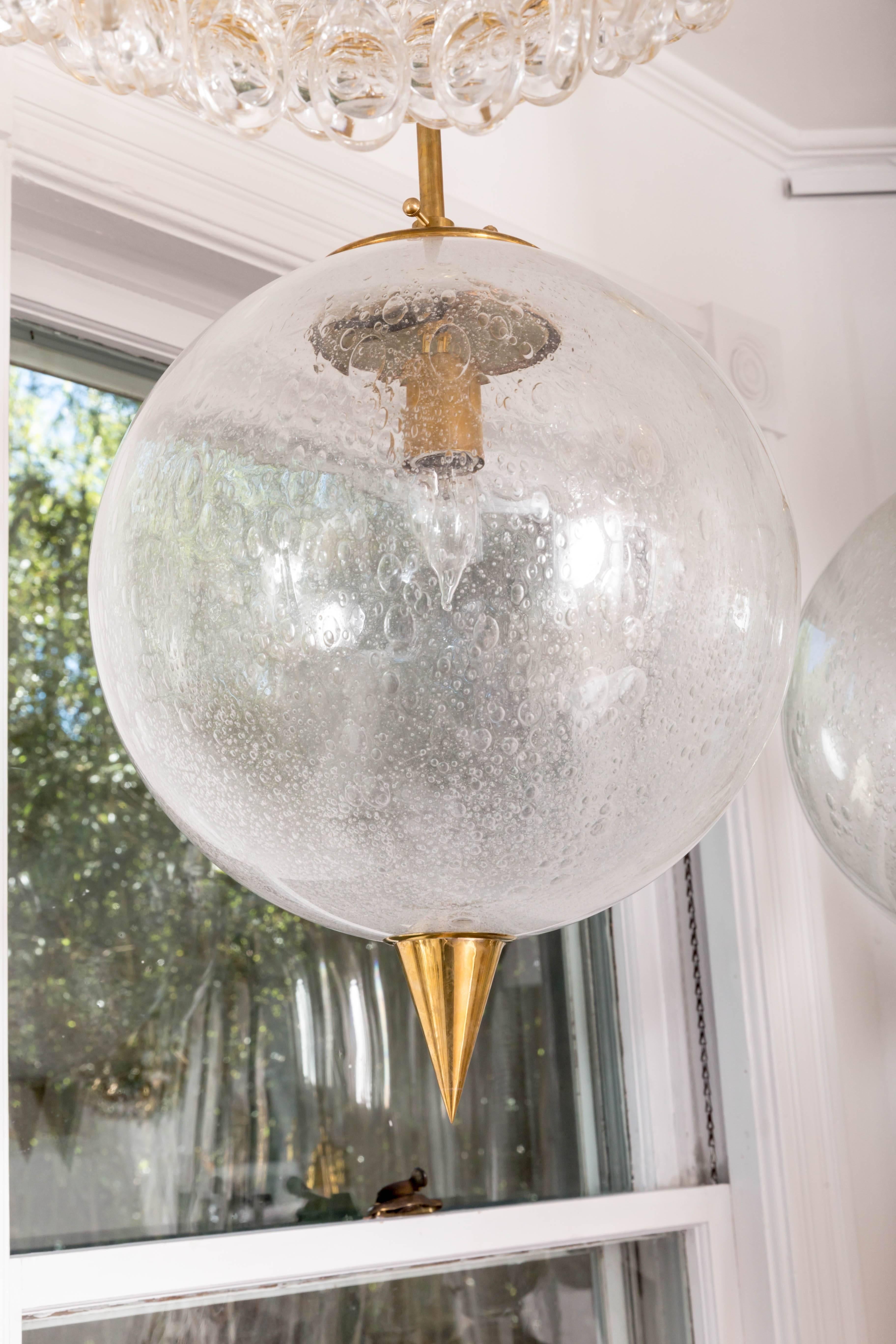 Spherical Clear Glass Pendant with Inclusive Air Bubbles and Brass Details For Sale 1