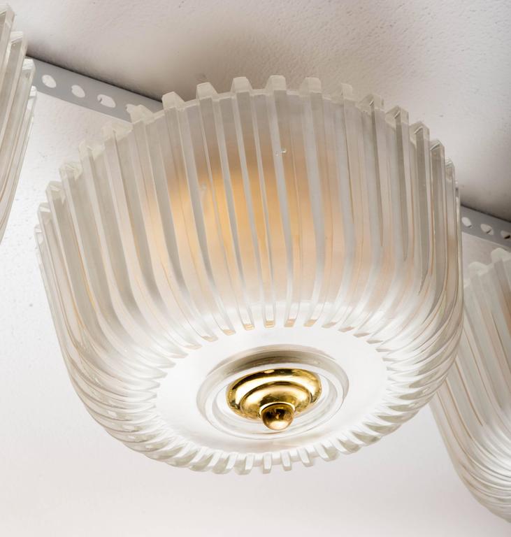 Fluted Frosted Glass Flush Mount Ceiling Fixture with Brass Detail at
