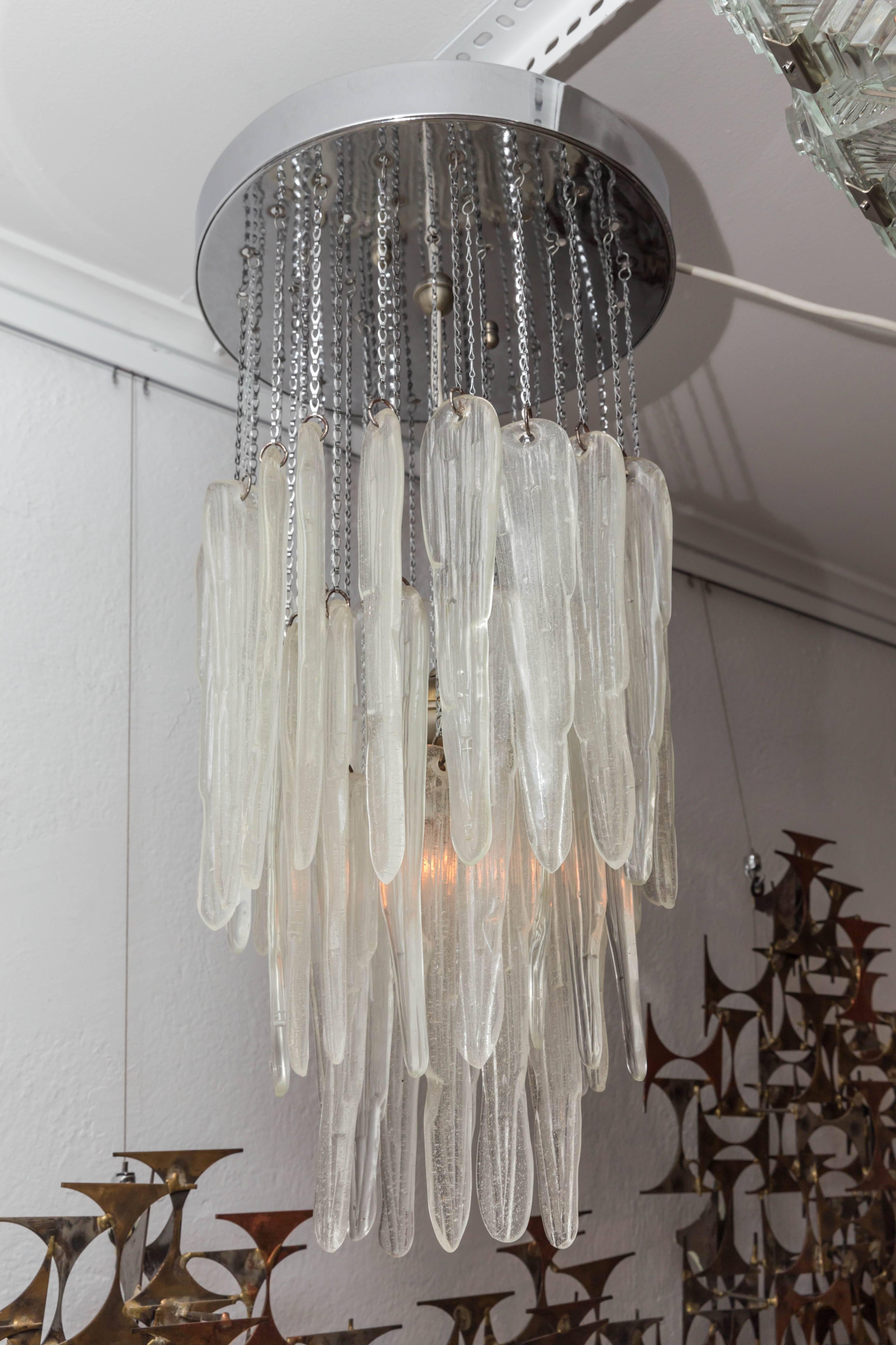 Glass icicle chandelier with chrome detail.