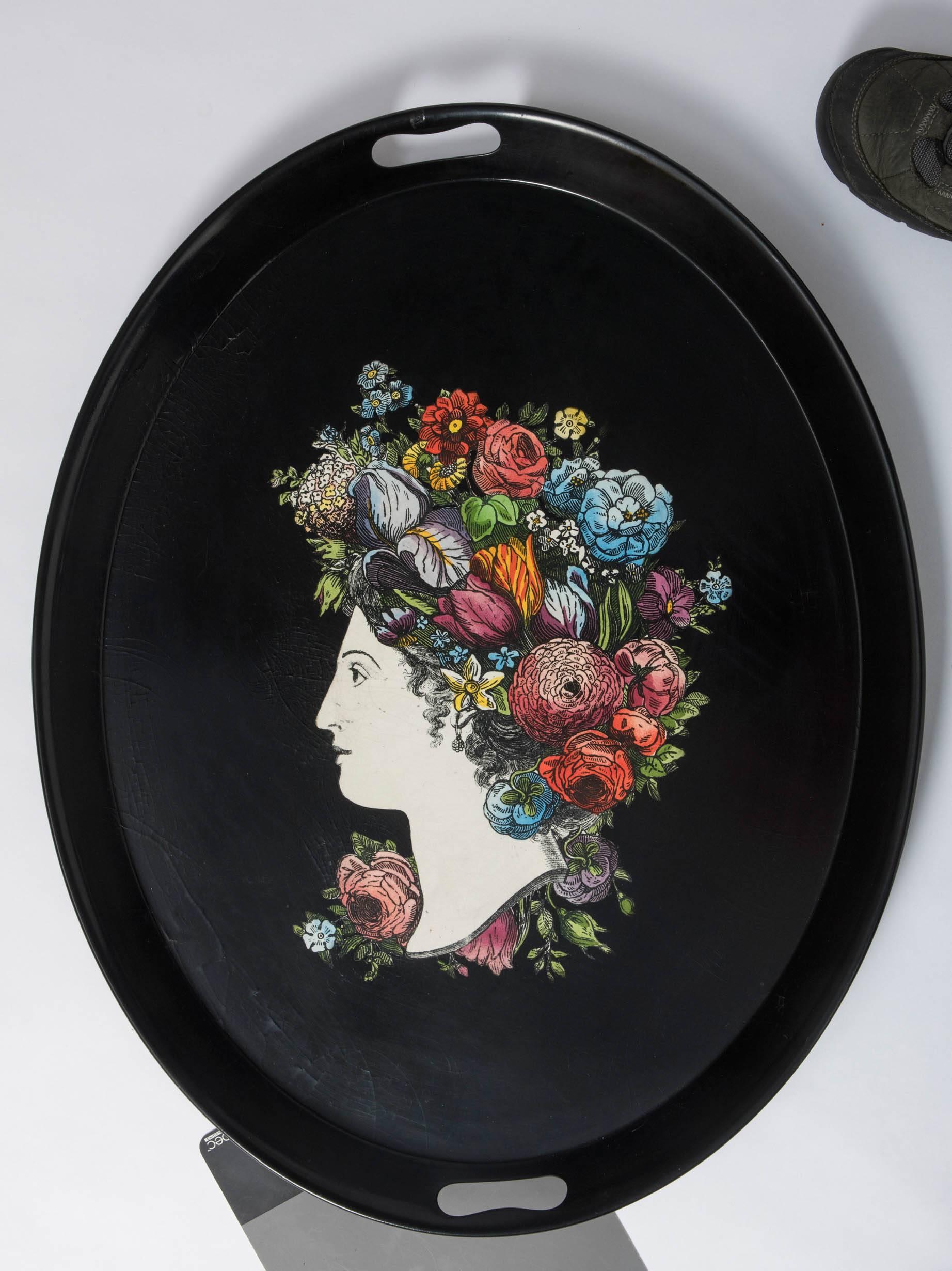 Piero Fornasetti metal serving tray "Flora".
Metal, lithographically printed and hand colored.
Italy, circa 1960.
Measures: 68.5 cm x 55.5 cm.
             