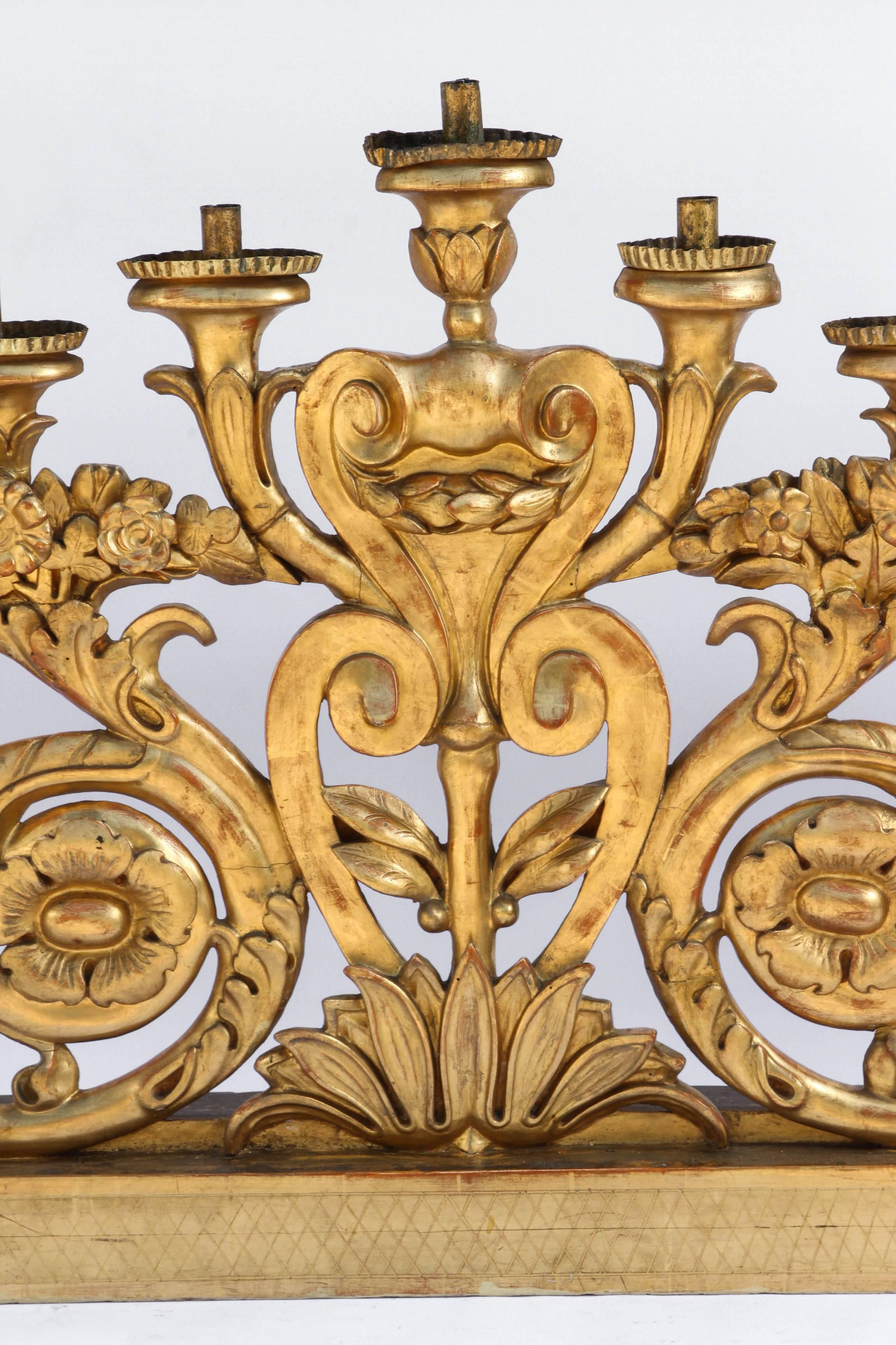 Carved Pair of Oversized 19th Century Italian Giltwood Nine Candleholder For Sale