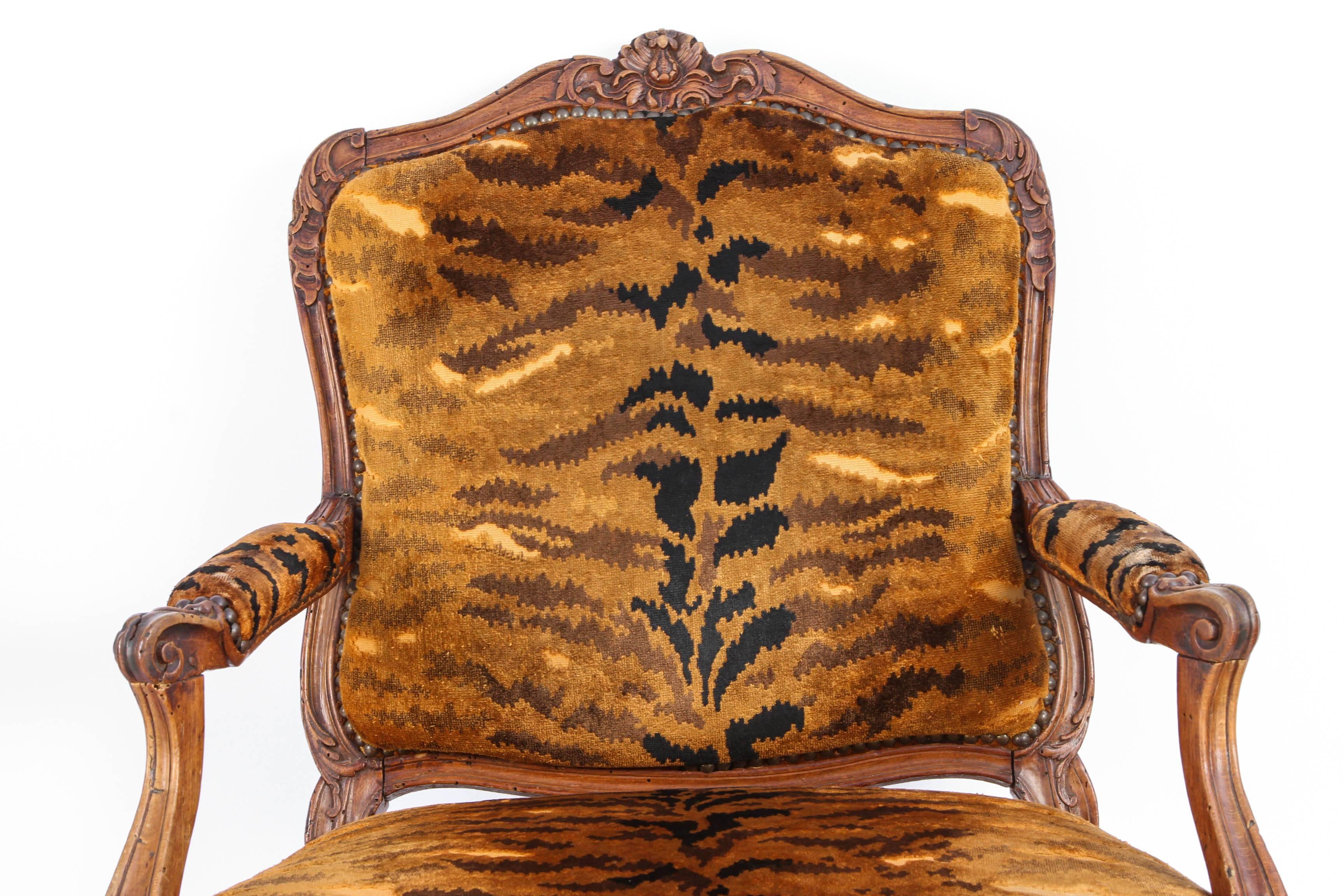 Hand-Carved Similar Pair of 18th Century French Regence Walnut Armchairs