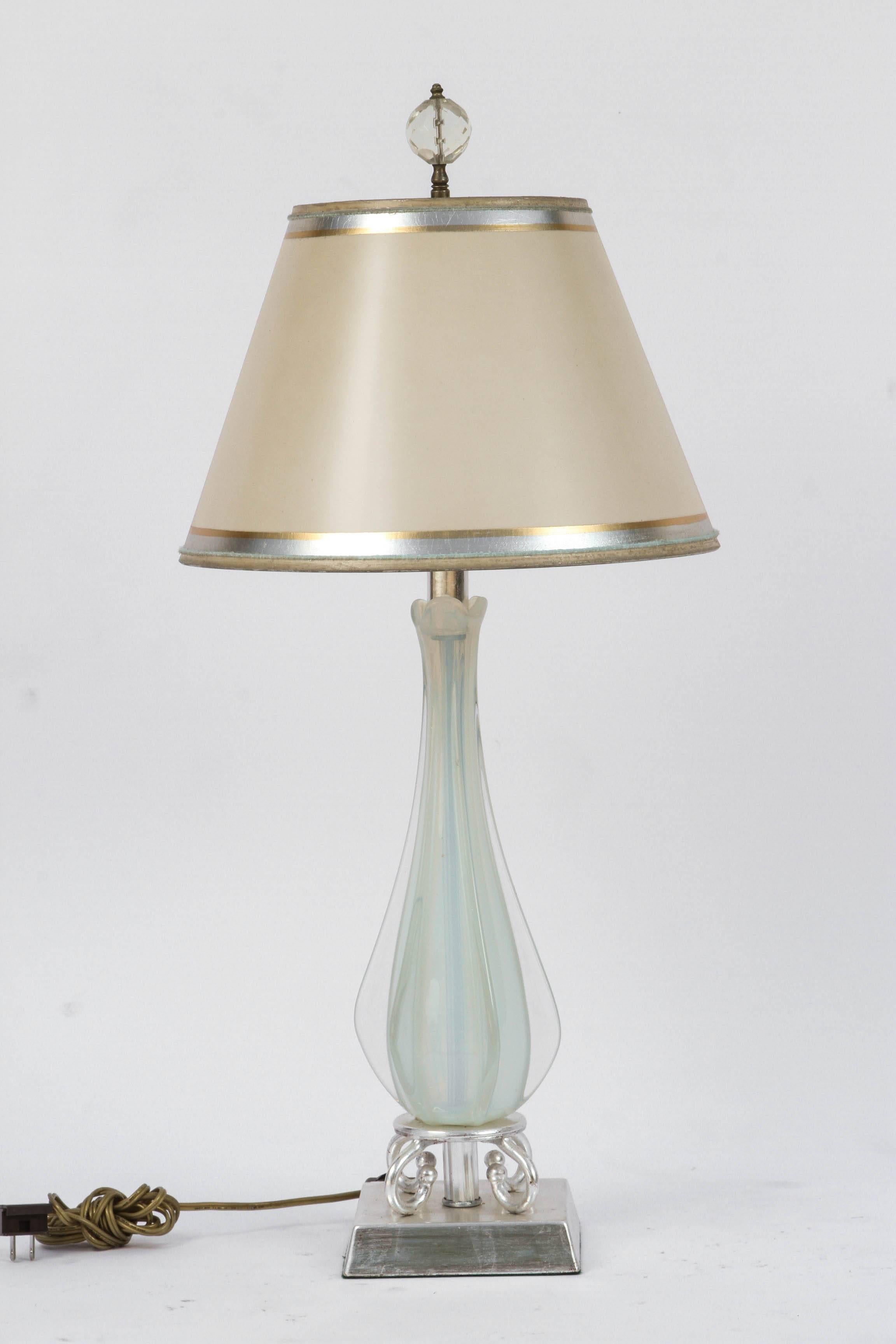 Pair of Mid-Century opaline and clear Italian Murano lamps on original bases that have been recently silver leafed. The handmade shades are included.
