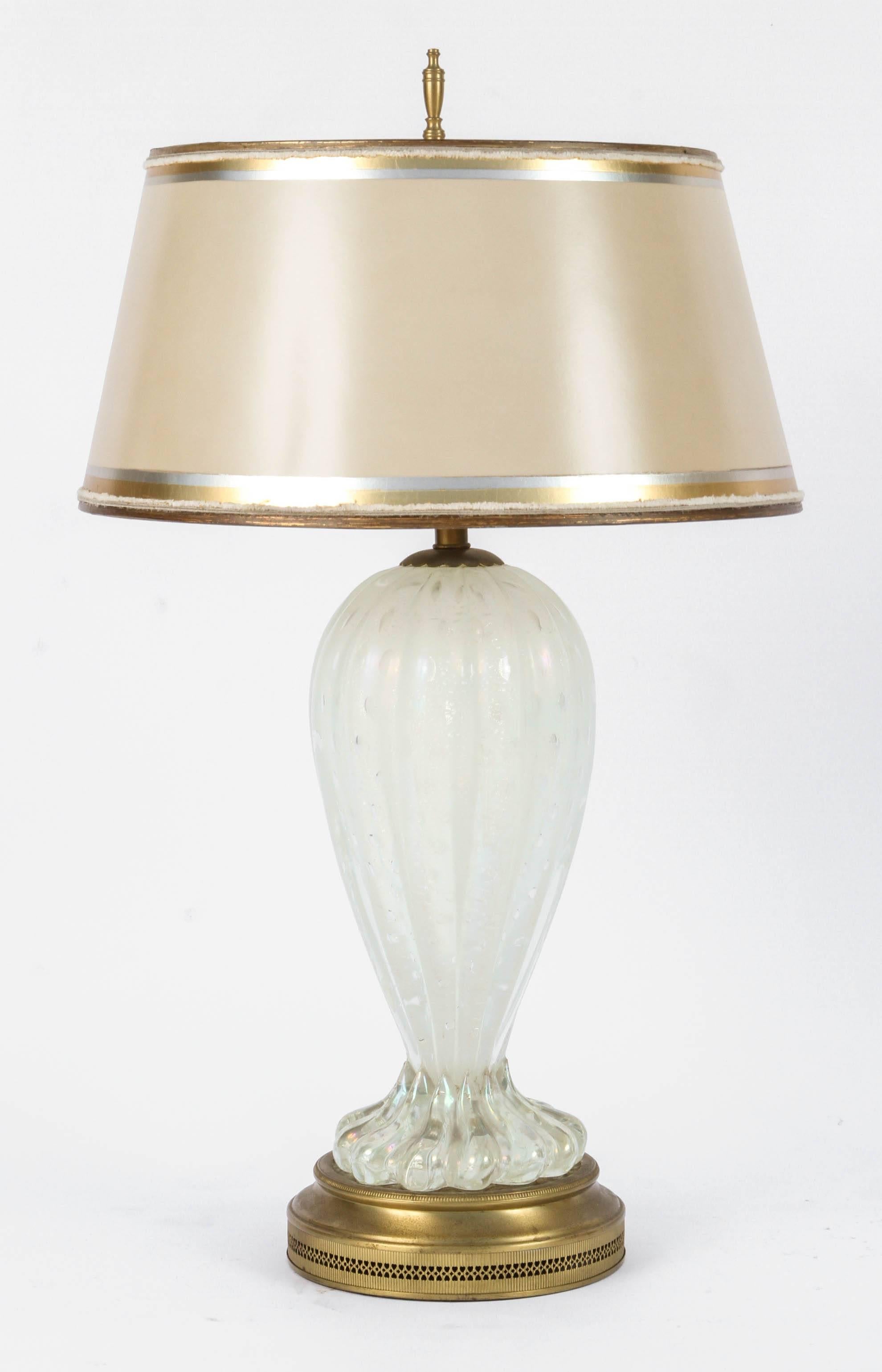 Pair of Mid-Century Italian Murano iridescent lamps with white controlled bubbles on original bases that have been recently gold leafed. 
The shades are included and are handmade of parchment paper. They are hand gilded and decorated in coordinating
