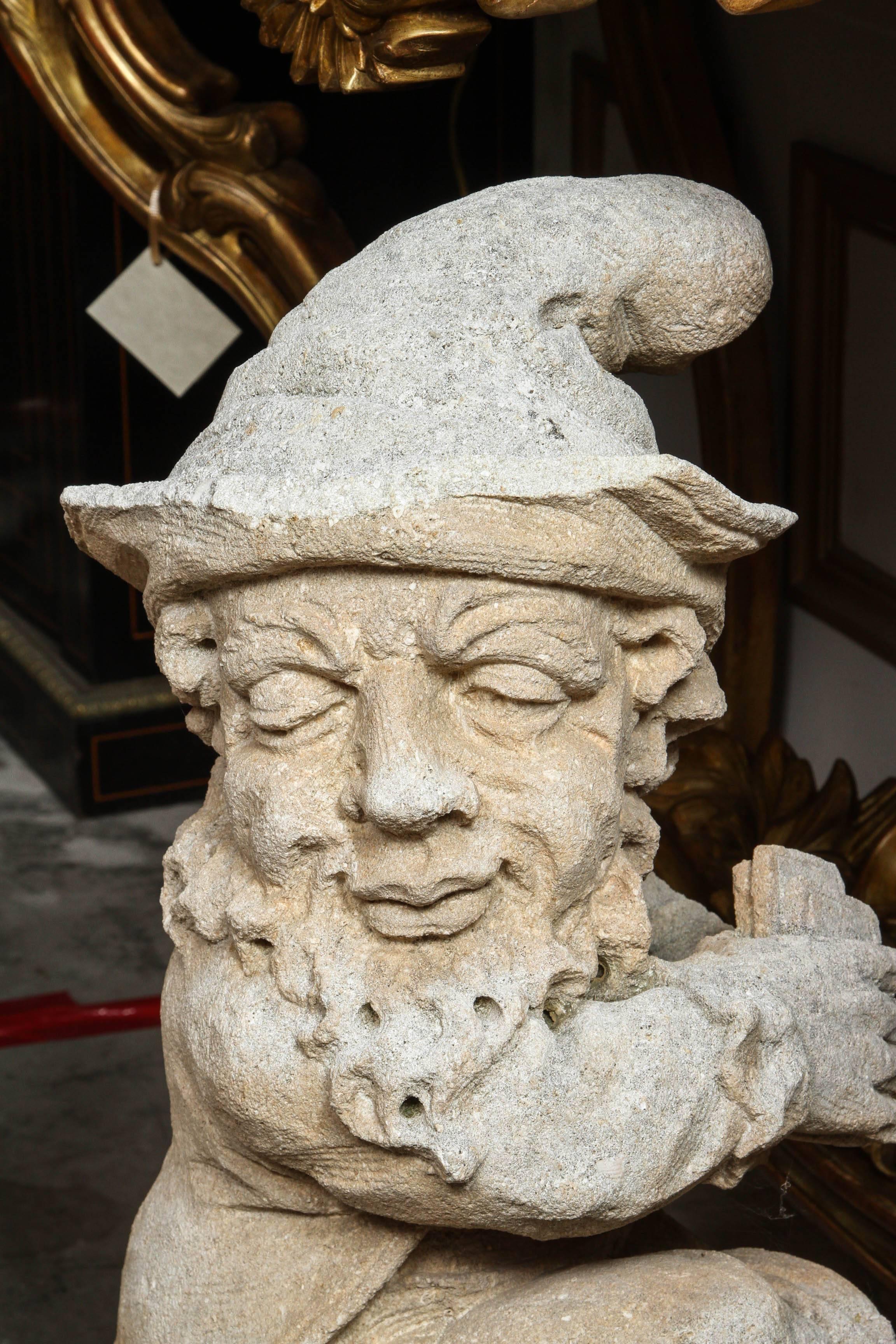 Group of Four French Carved Limestone Gnomes from the Early 1900s 1