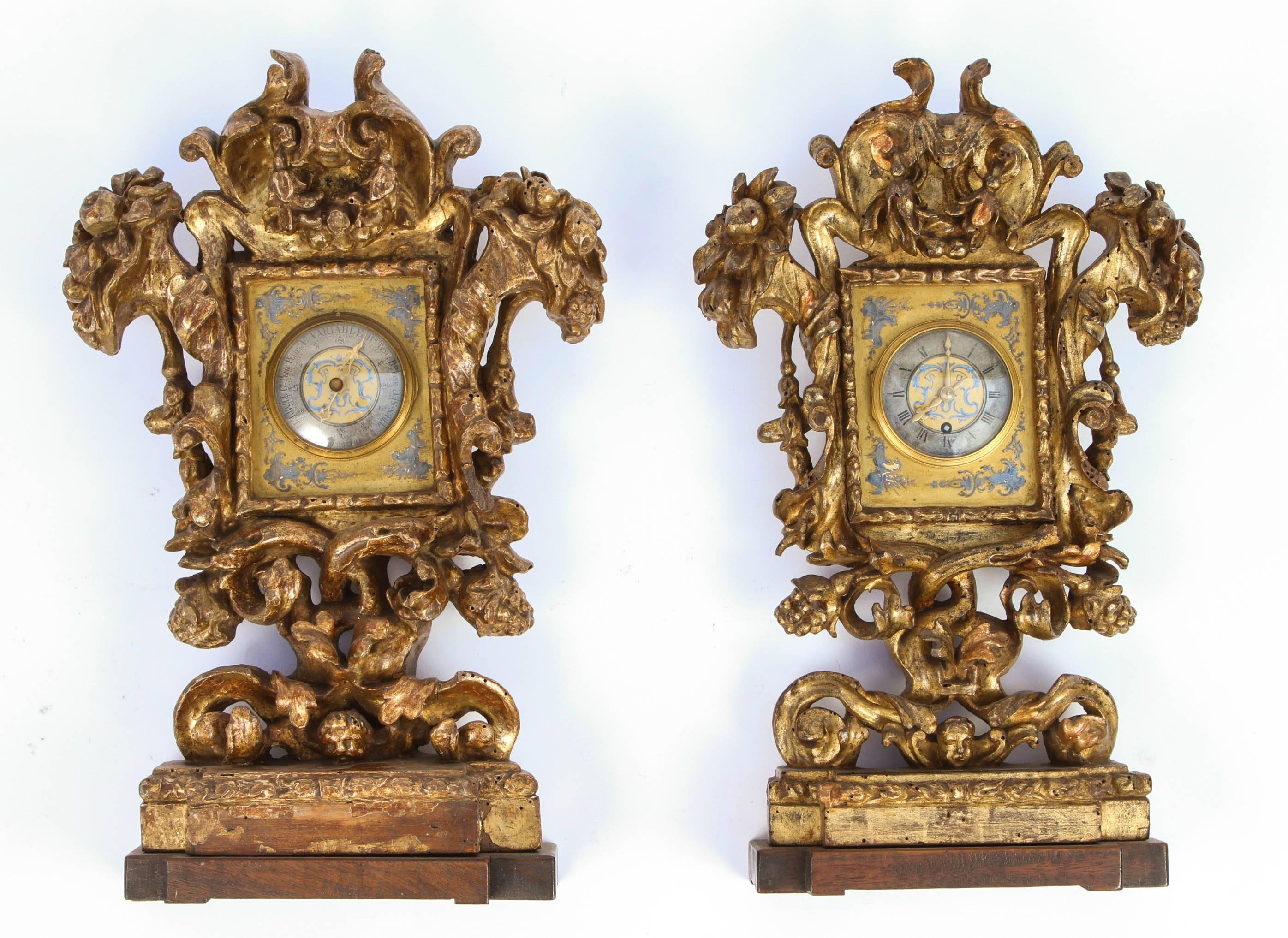 Pair of 18th century Italian carved wood fragments with clock and barometer.