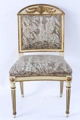 Group of Twelve 19th Century Italian Gilded and Carved Saber Dining Chairs