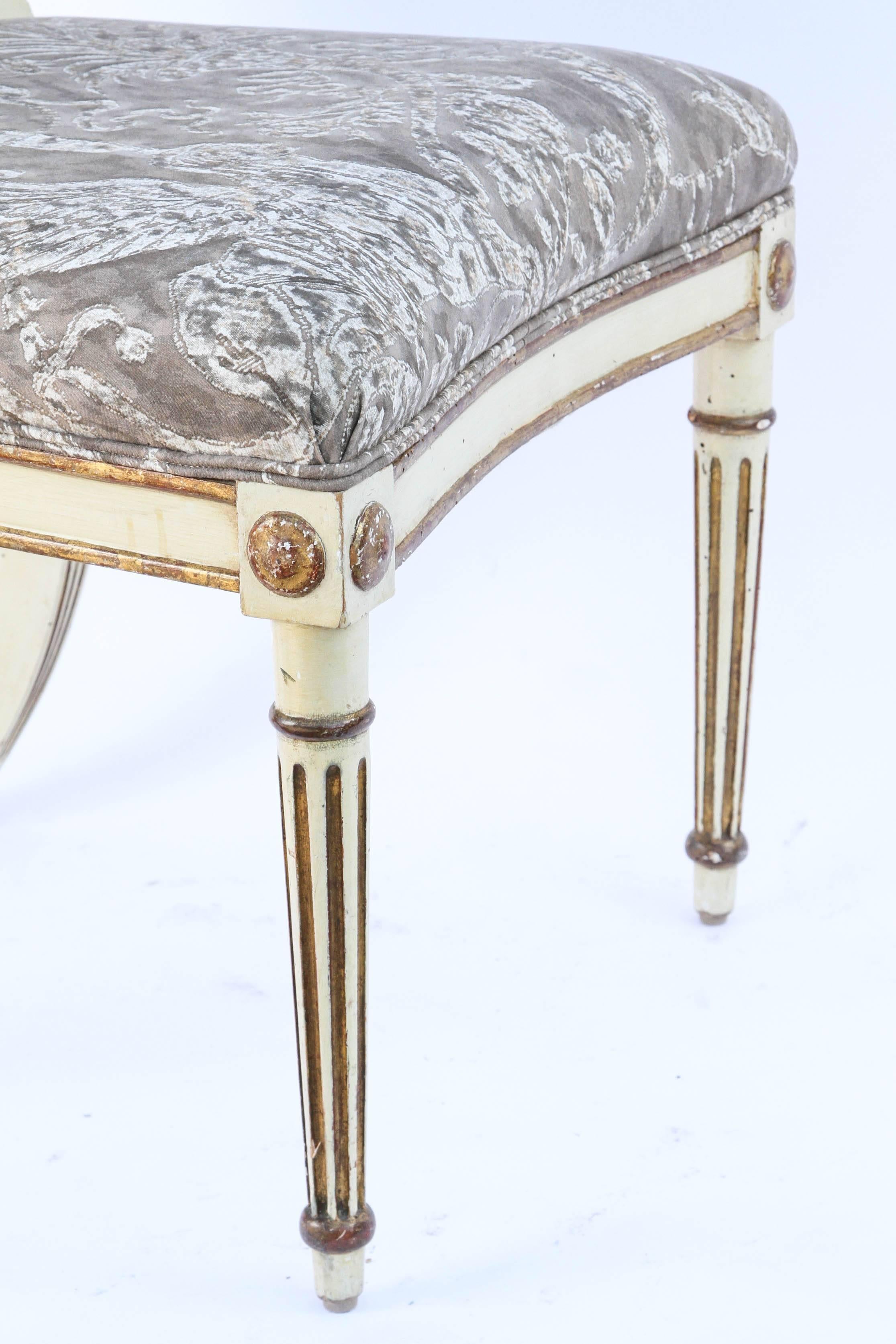 Group of Twelve 19th Century Italian Gilded and Carved Saber Dining Chairs For Sale 1