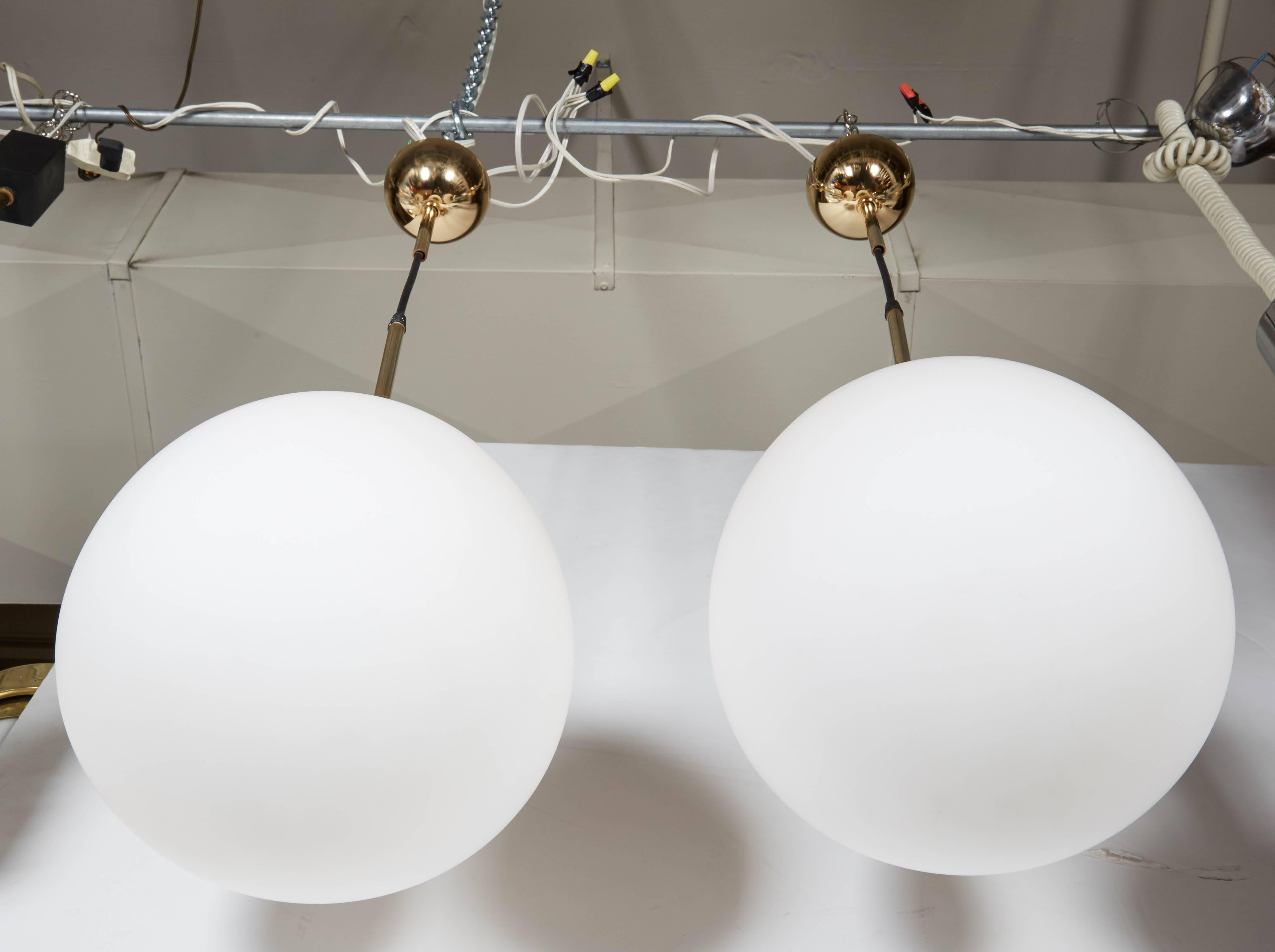 Mid-20th Century Pair of 1950s Italian Case Glass Globe Pendant Lights by Stilnovo