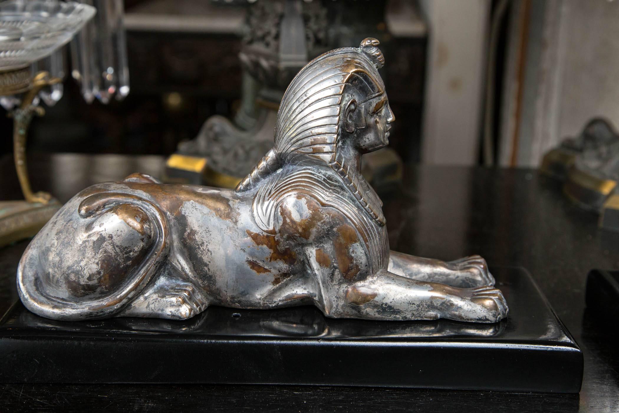 Cast Pair of French Empire Silvered Bronze Sphinxes
