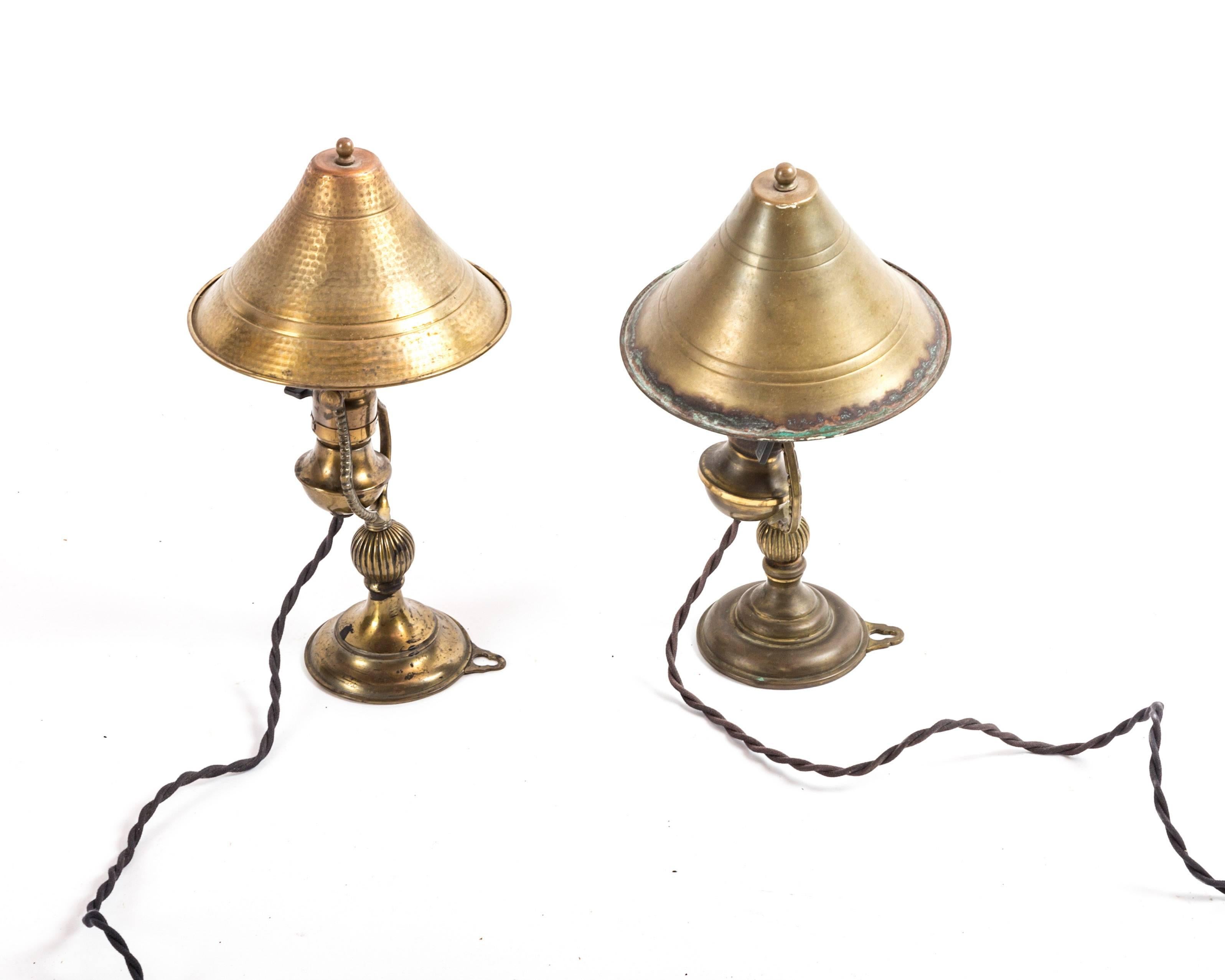 Turn of the century aged brass wall sconces with brass dimpled shades. Wired for USA.