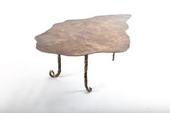 Mesa baja de bronce fundido hecha a medida