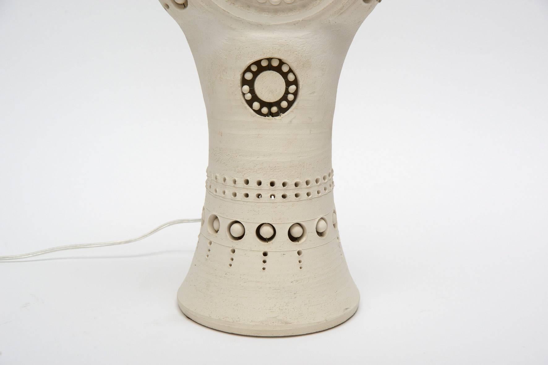 Small table lamp made of ceramic by the French artist Georges Pelletier. One source of light inside the lamp, signed.