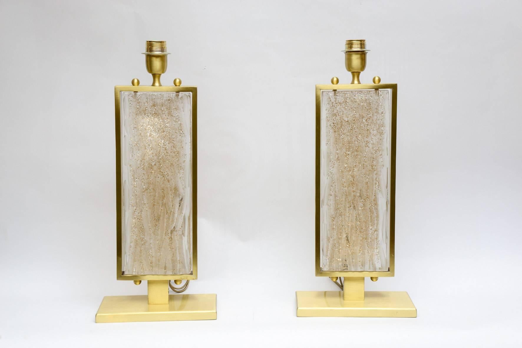 Pair of table lamps in Murano glass and metal.