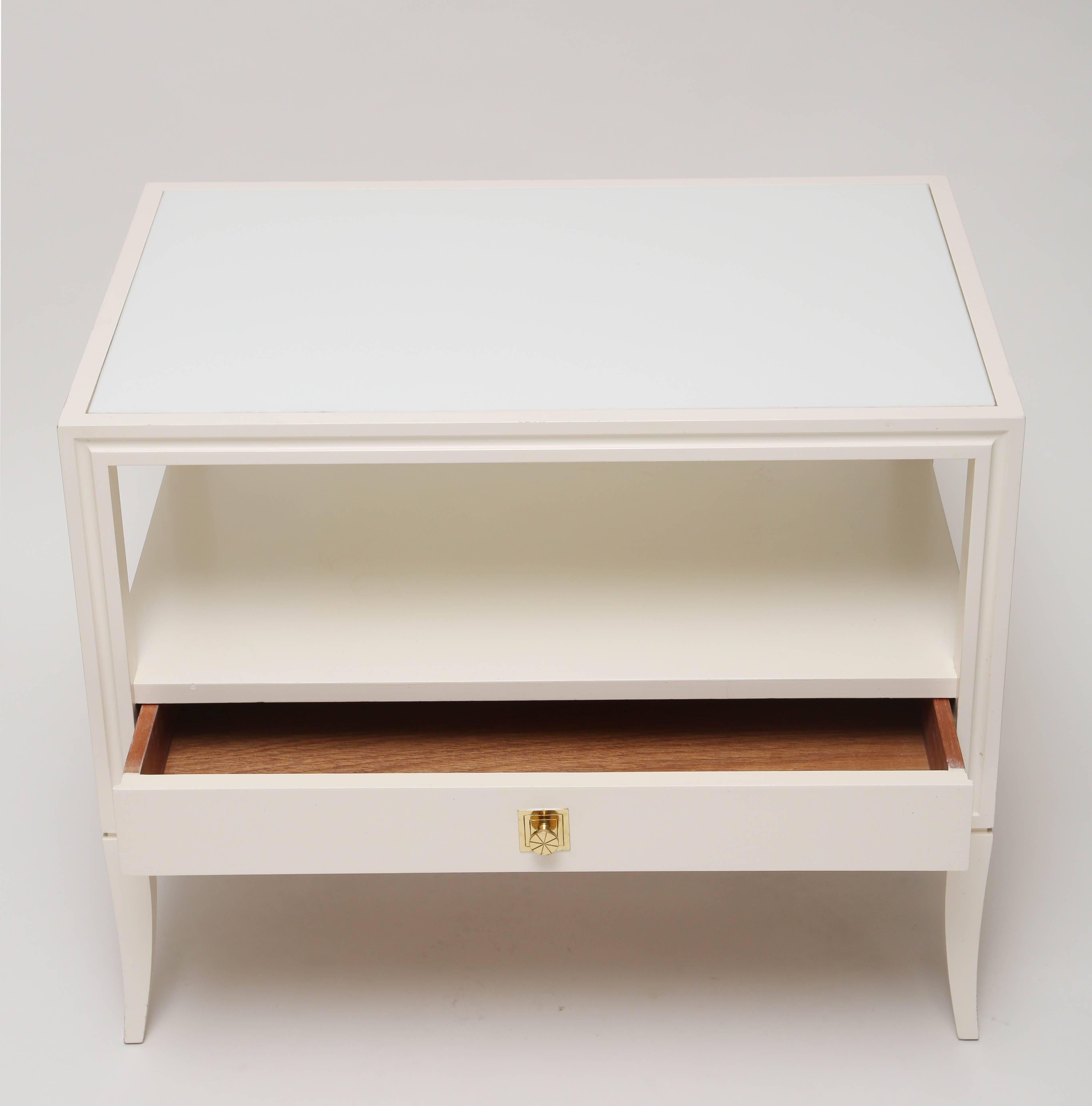Great pair of nightstands or side tables 
with milk white glass insert tops and brass
hardware.