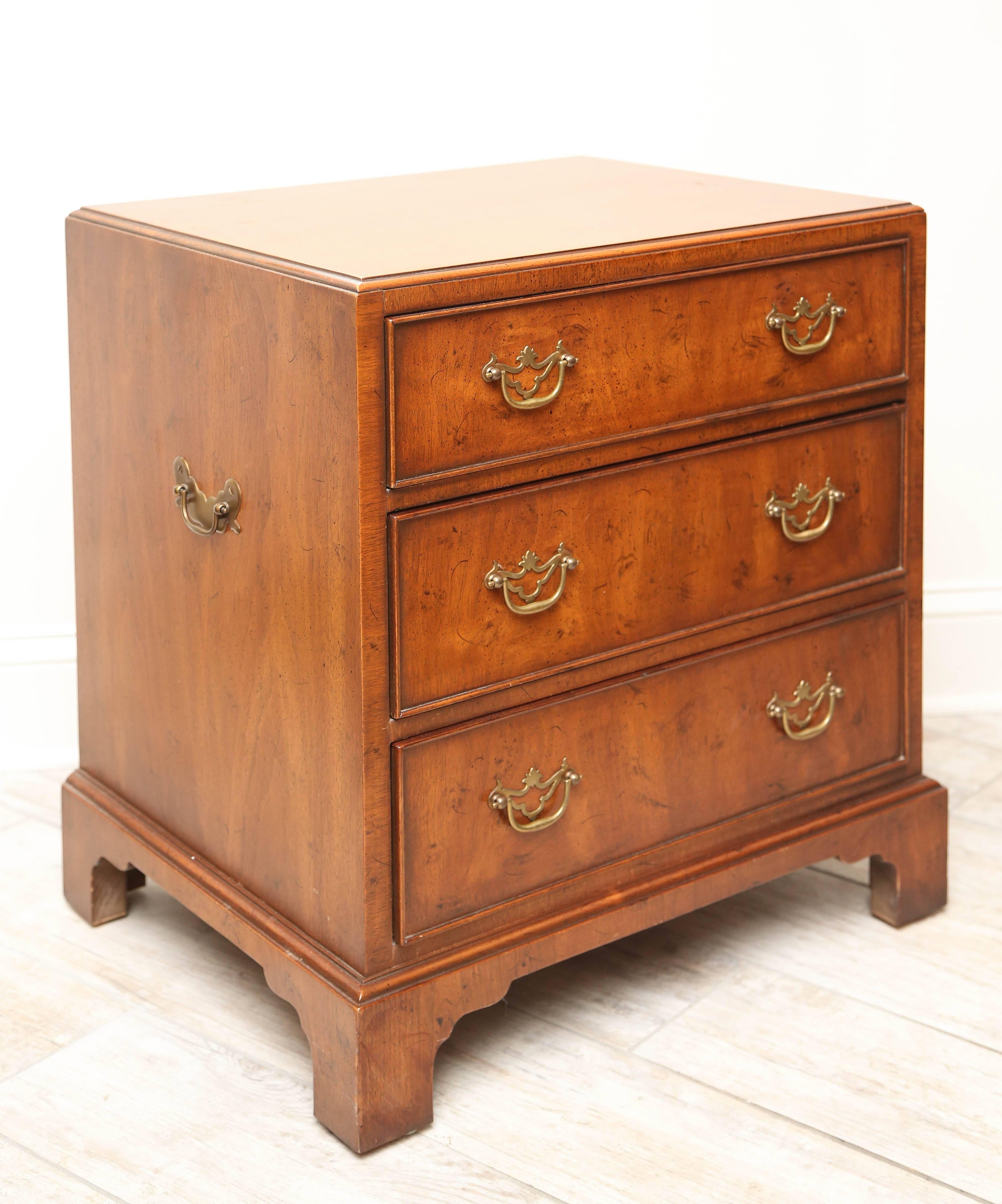 Charming three-drawer Campaign chest with brass pulls and handles on sides.